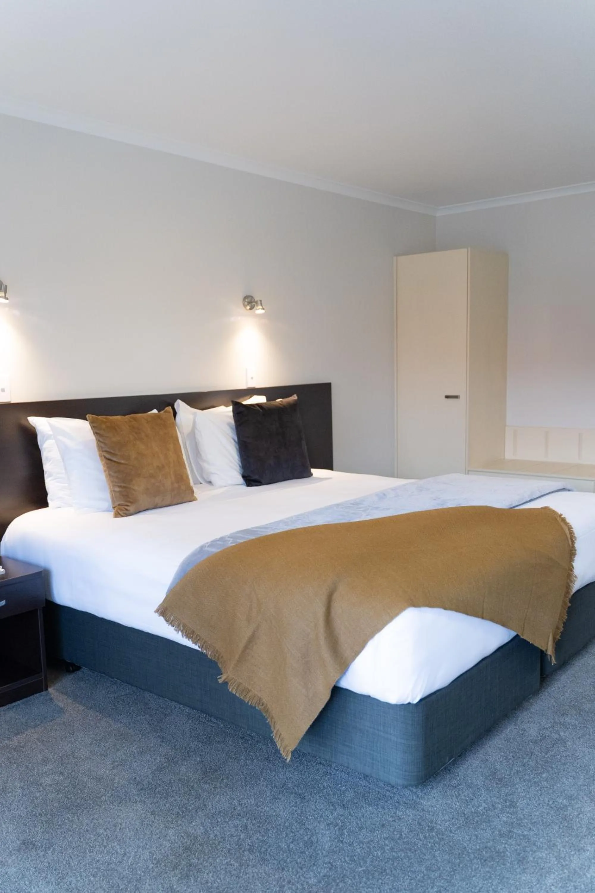 Bed in Pacific Coast Motor Lodge