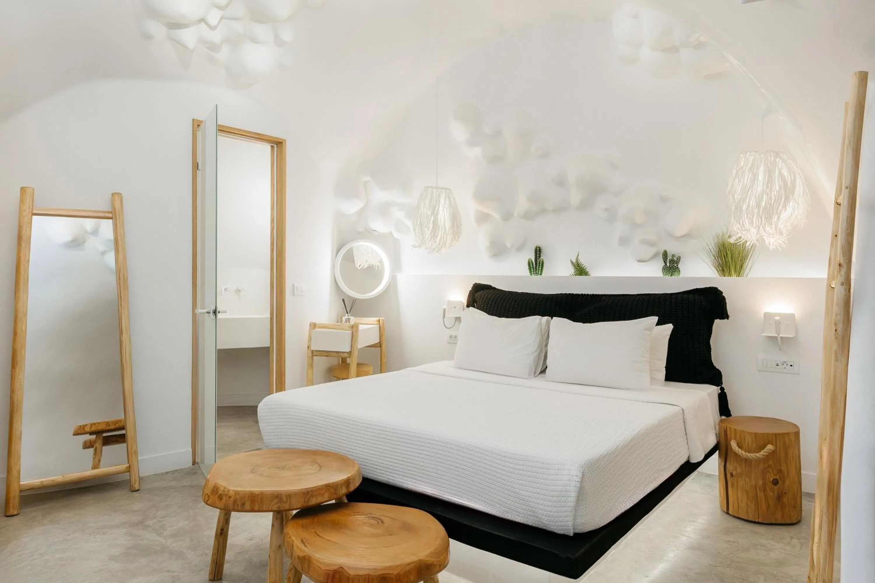 Bed in Theano Cave Suites & Villas