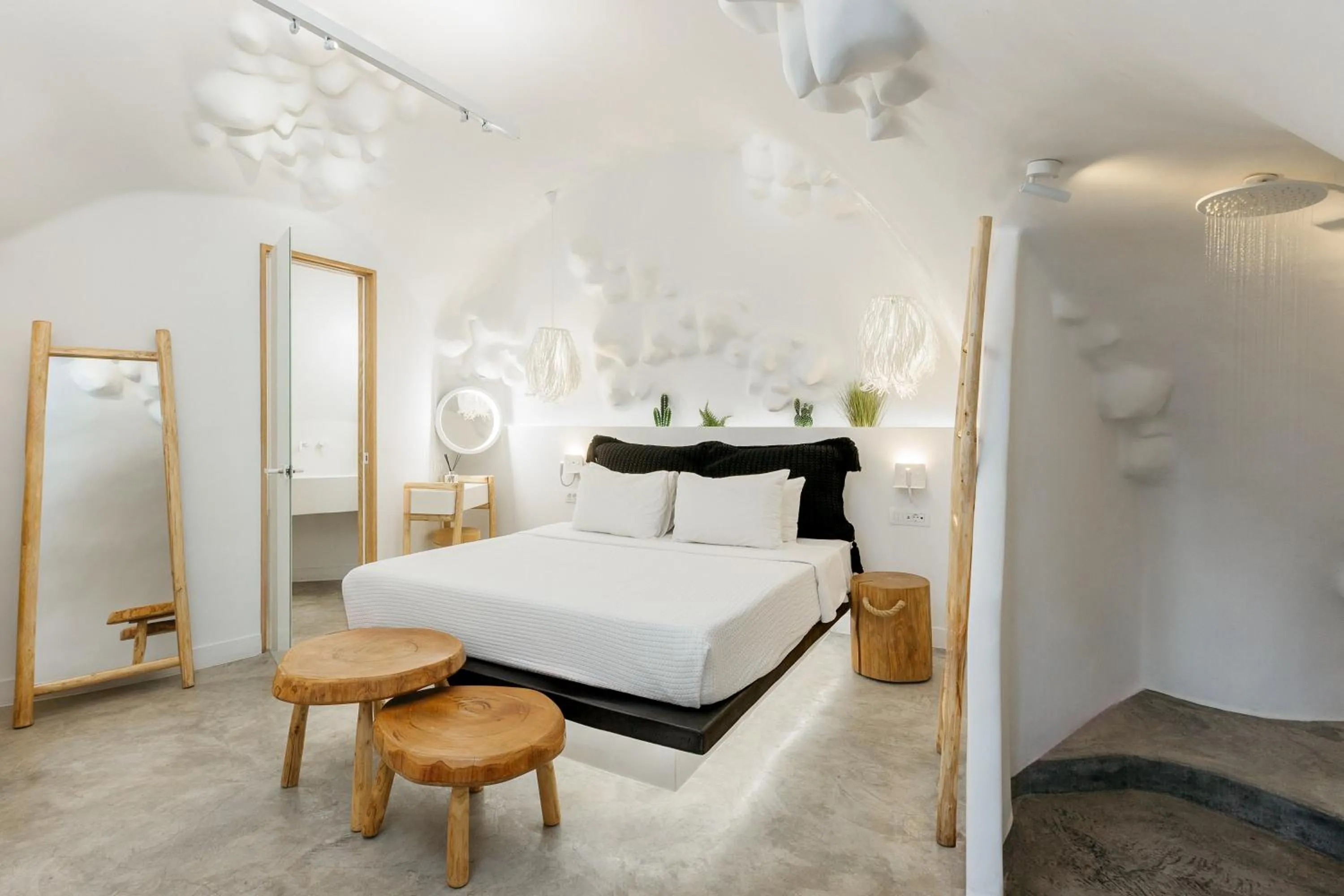 Bed in Theano Cave Suites & Villas