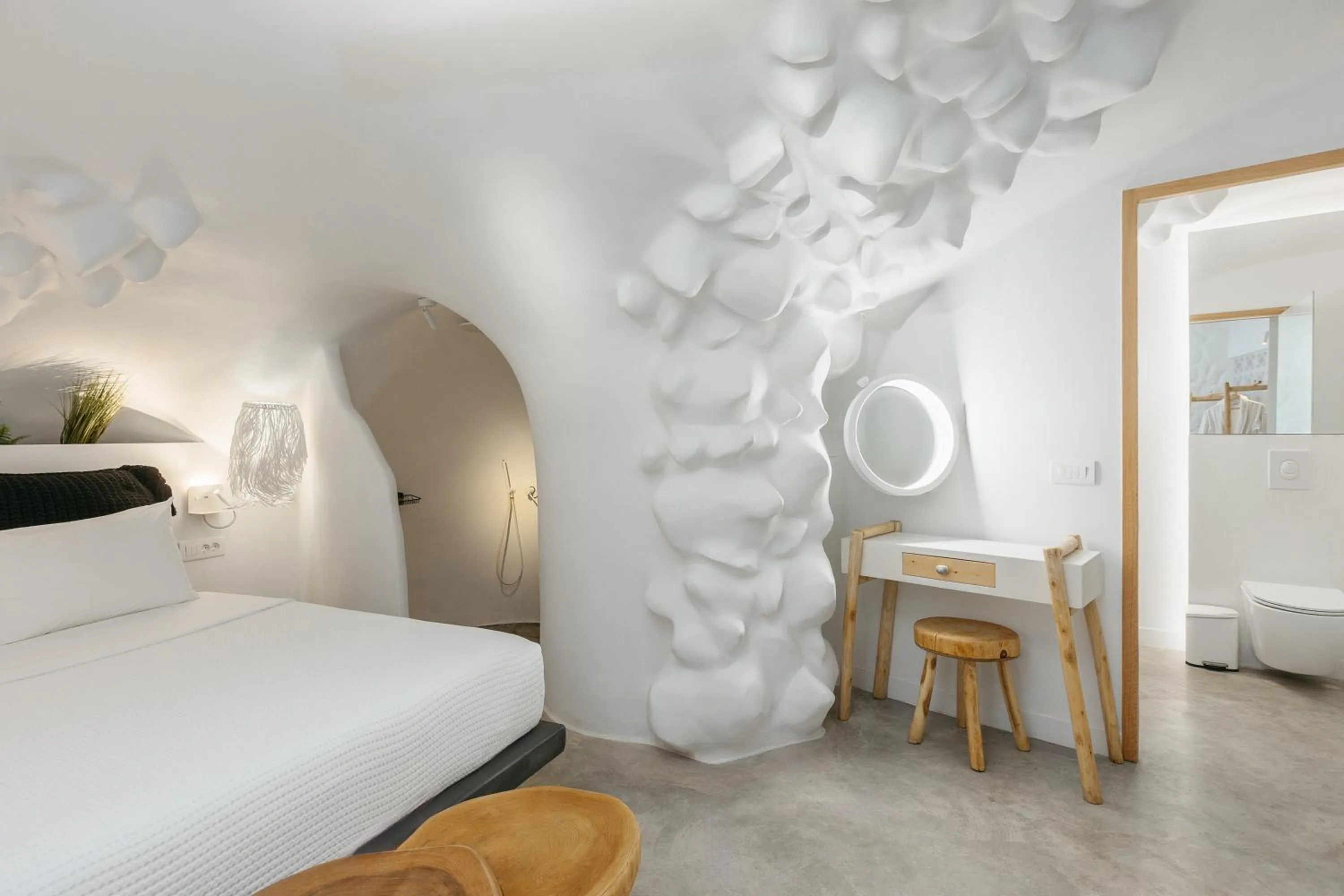 Bed in Theano Cave Suites & Villas