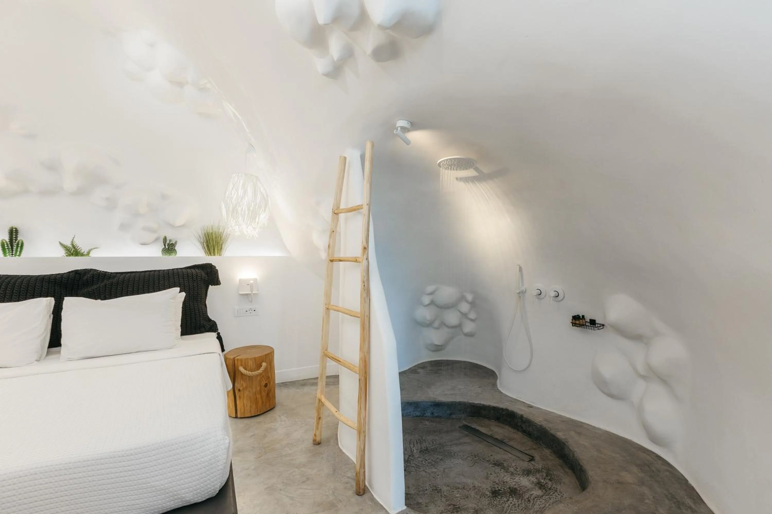 Bed in Theano Cave Suites & Villas
