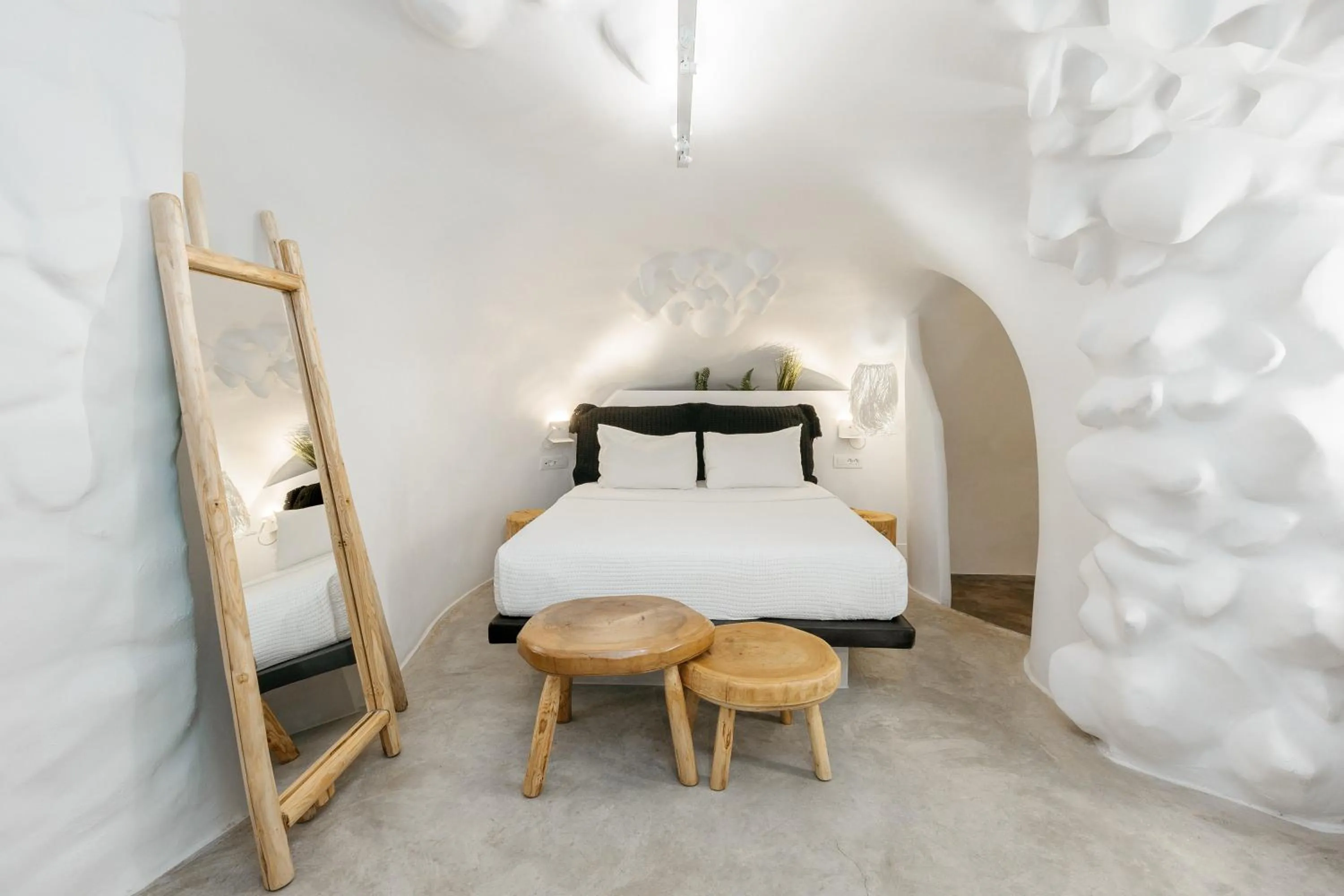 Bed in Theano Cave Suites & Villas