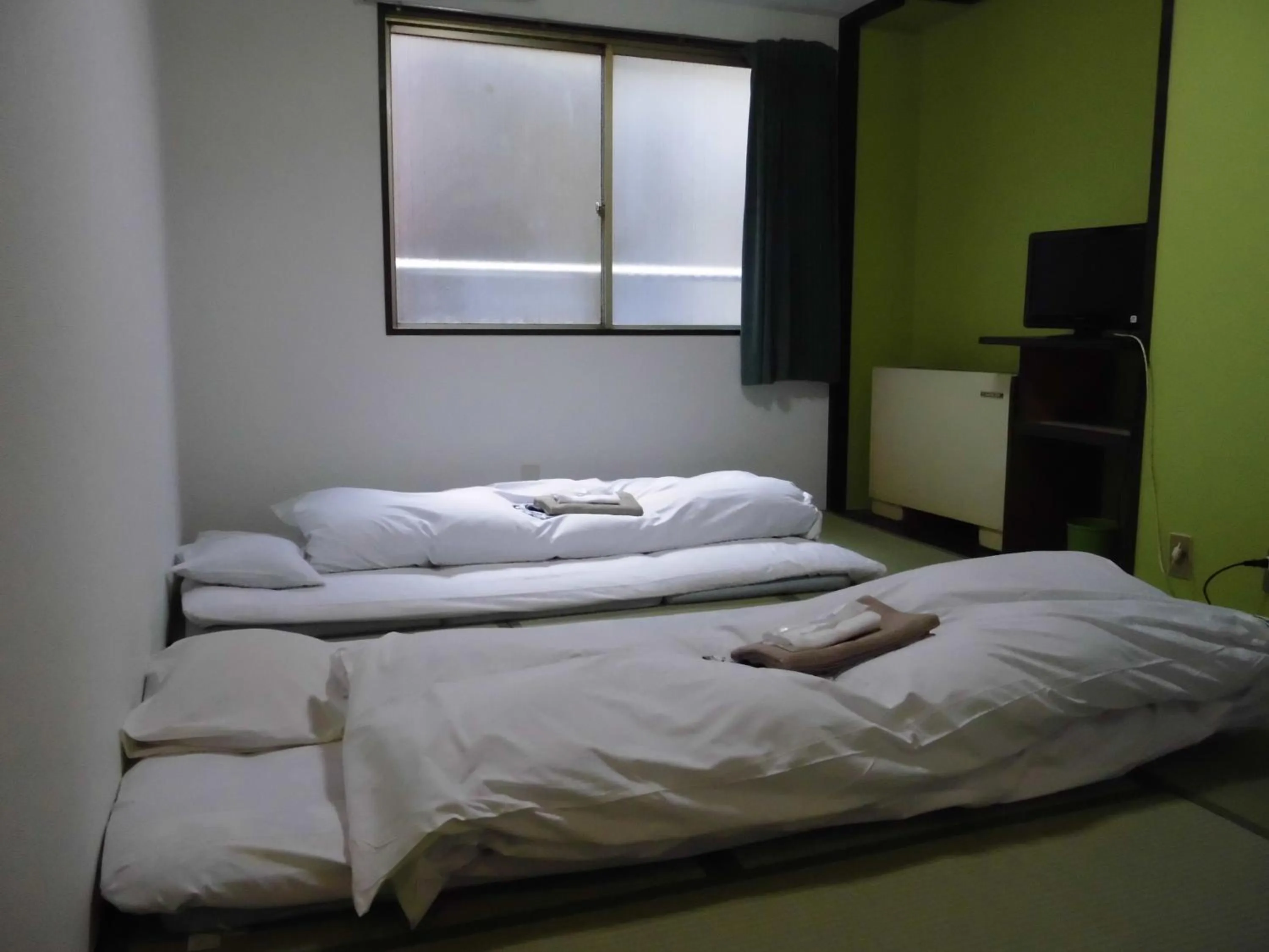 Photo of the whole room, Bed in Business Hotel Taiyo