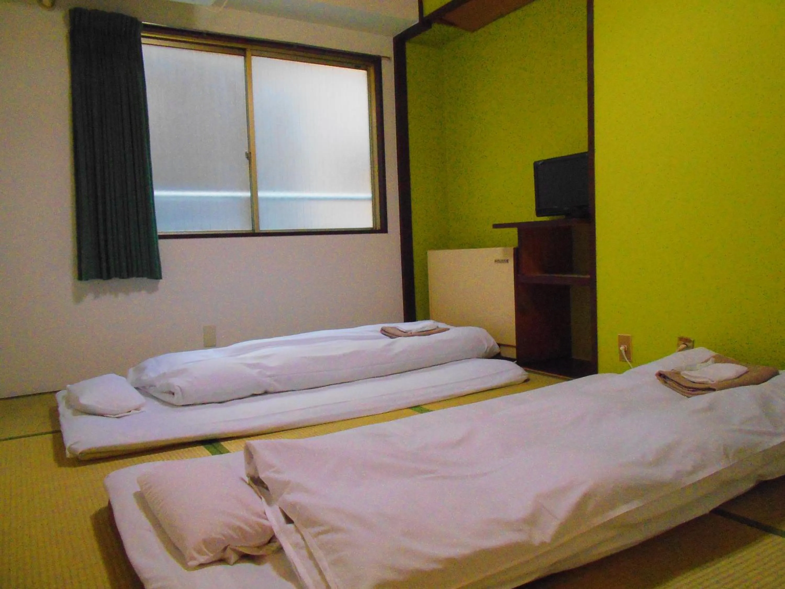 Bed in Business Hotel Taiyo