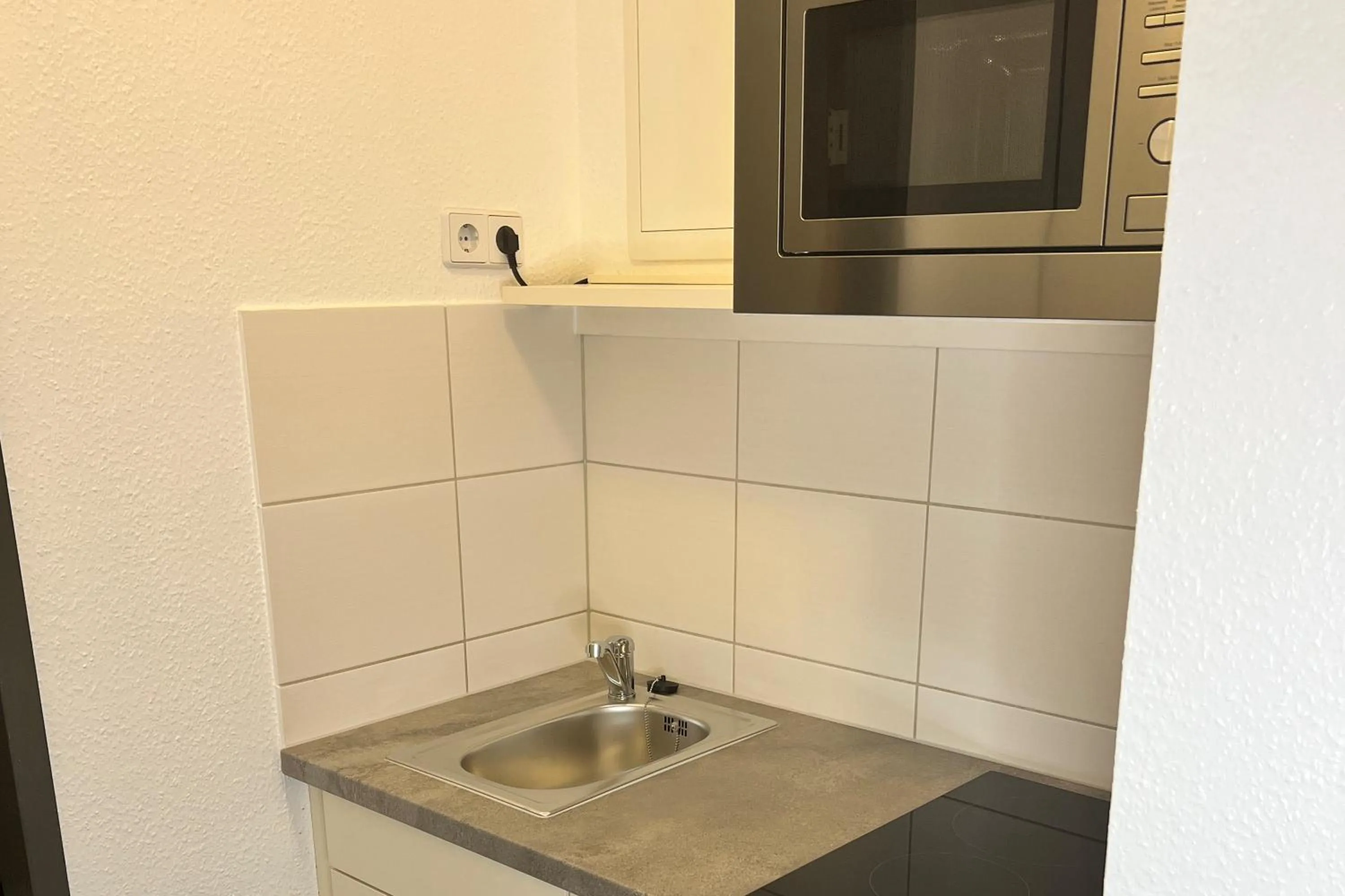 Kitchen or kitchenette in SKYAPPART Merseburg