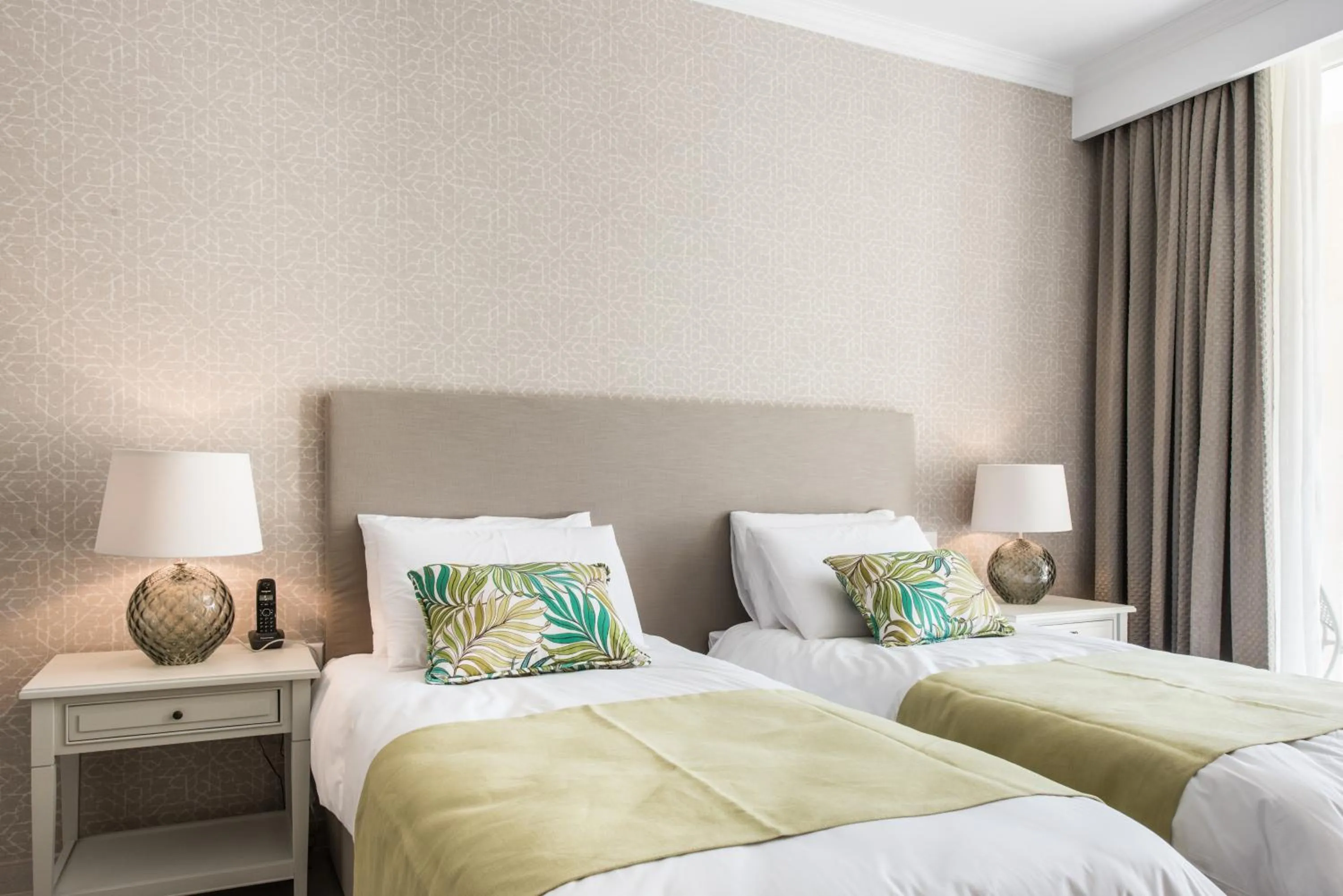 Bed in Cesca's Boutique Hotel