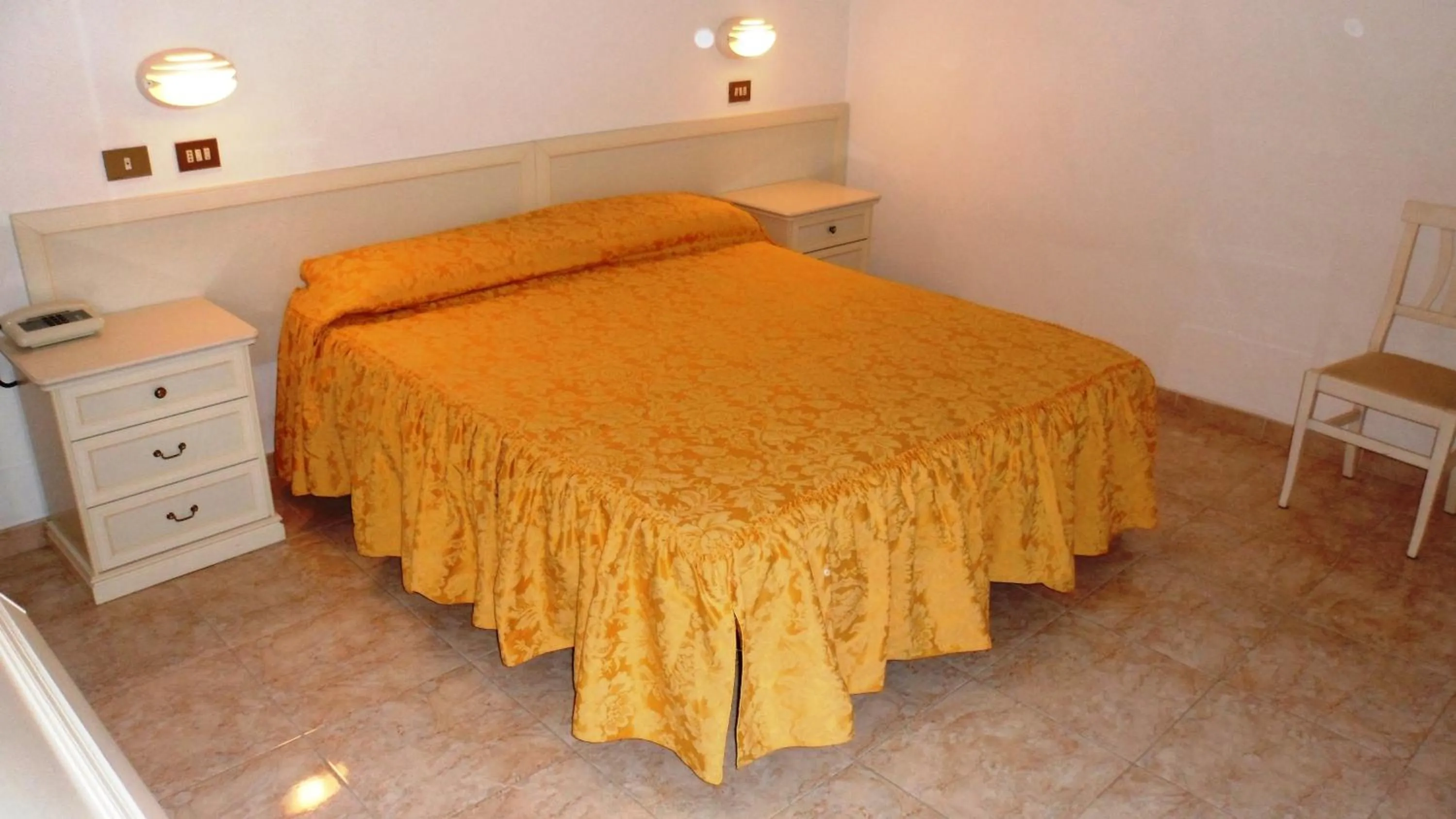 Bedroom in Hotel Reali