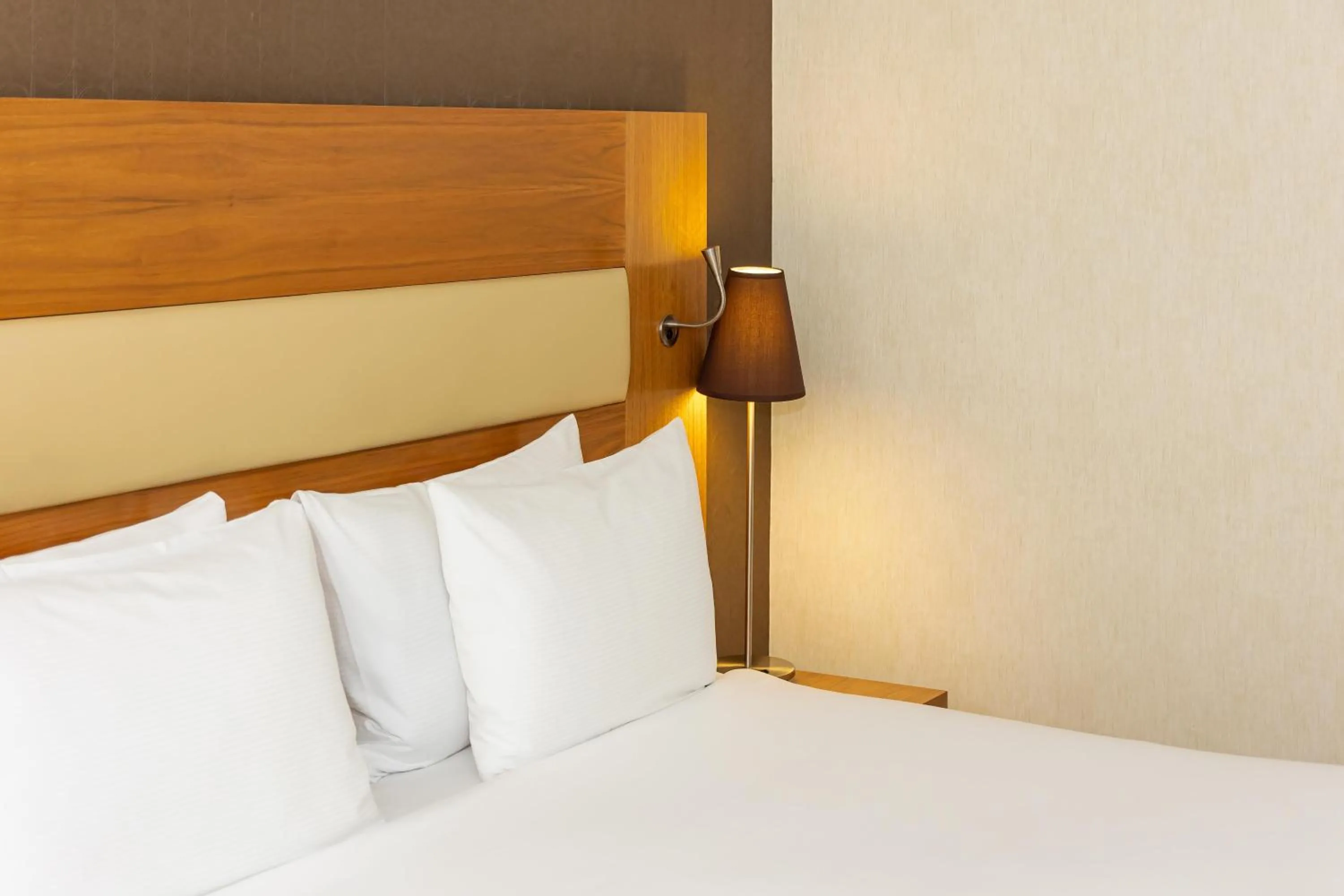 Bed in Hilton London Olympia