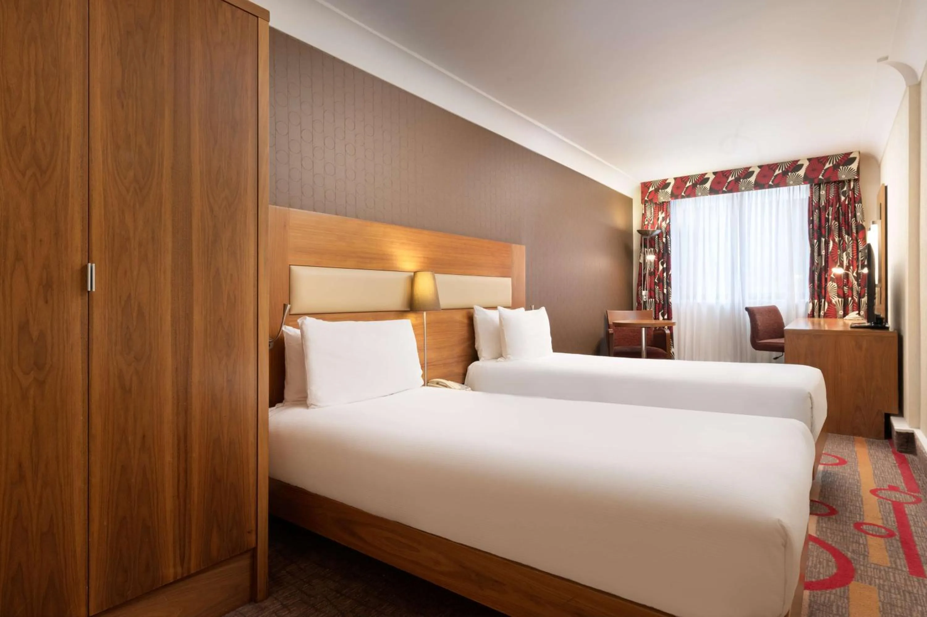 Bed in Hilton London Olympia