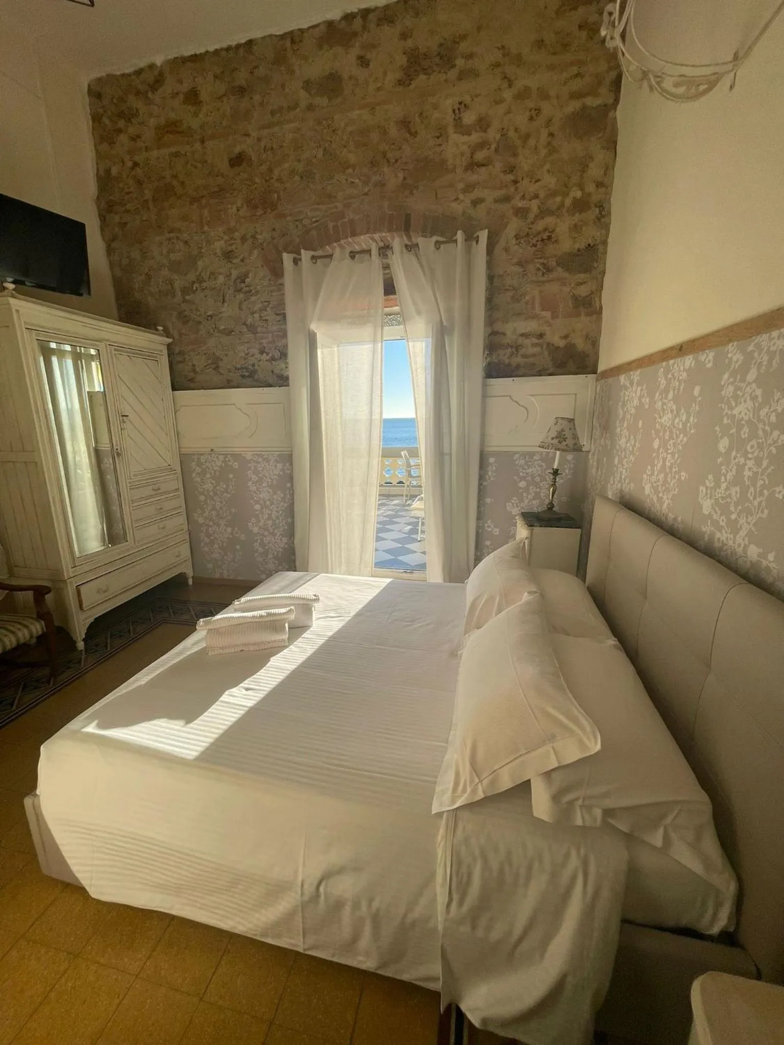 Photo of the whole room, Bed in Locanda Garzelli