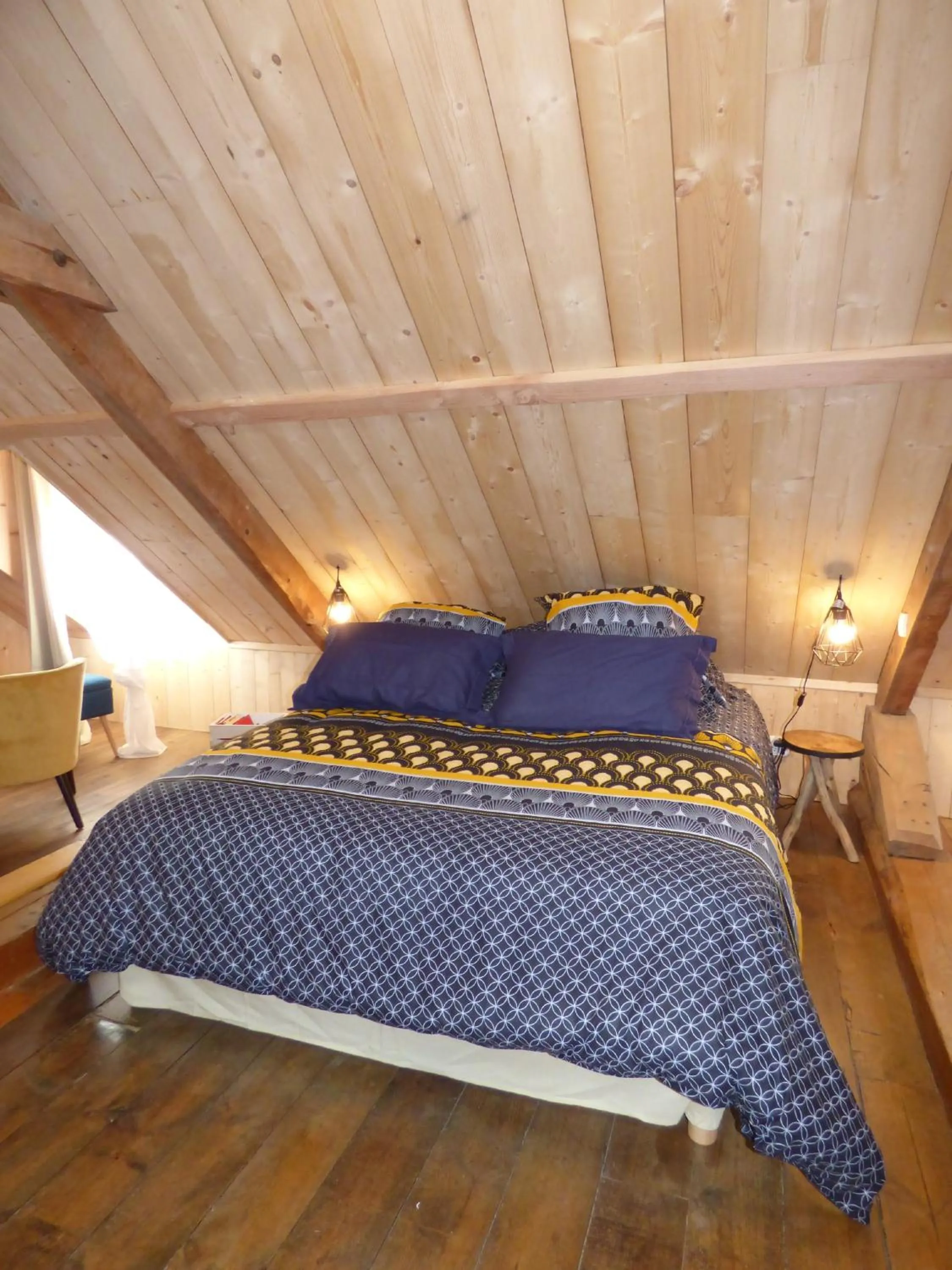 Bed in Chambres d'hôtes Chez Valérie Garage motos et vélos