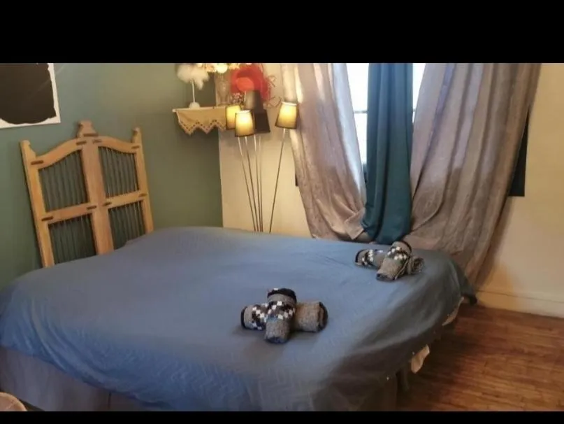 Bed in Chambres d'hôtes Chez Valérie Garage motos et vélos