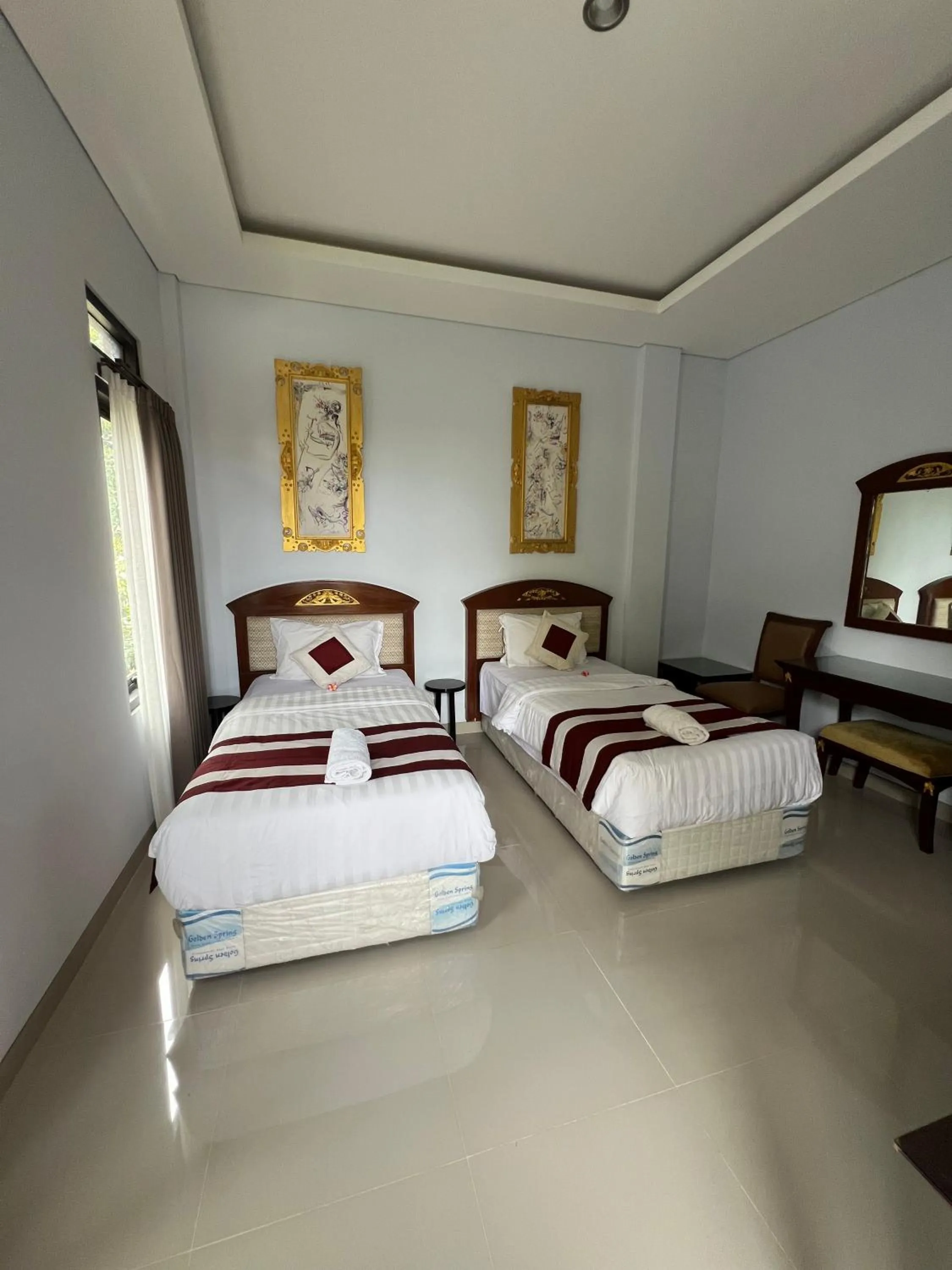 Bed in Mandhasativa Homestay