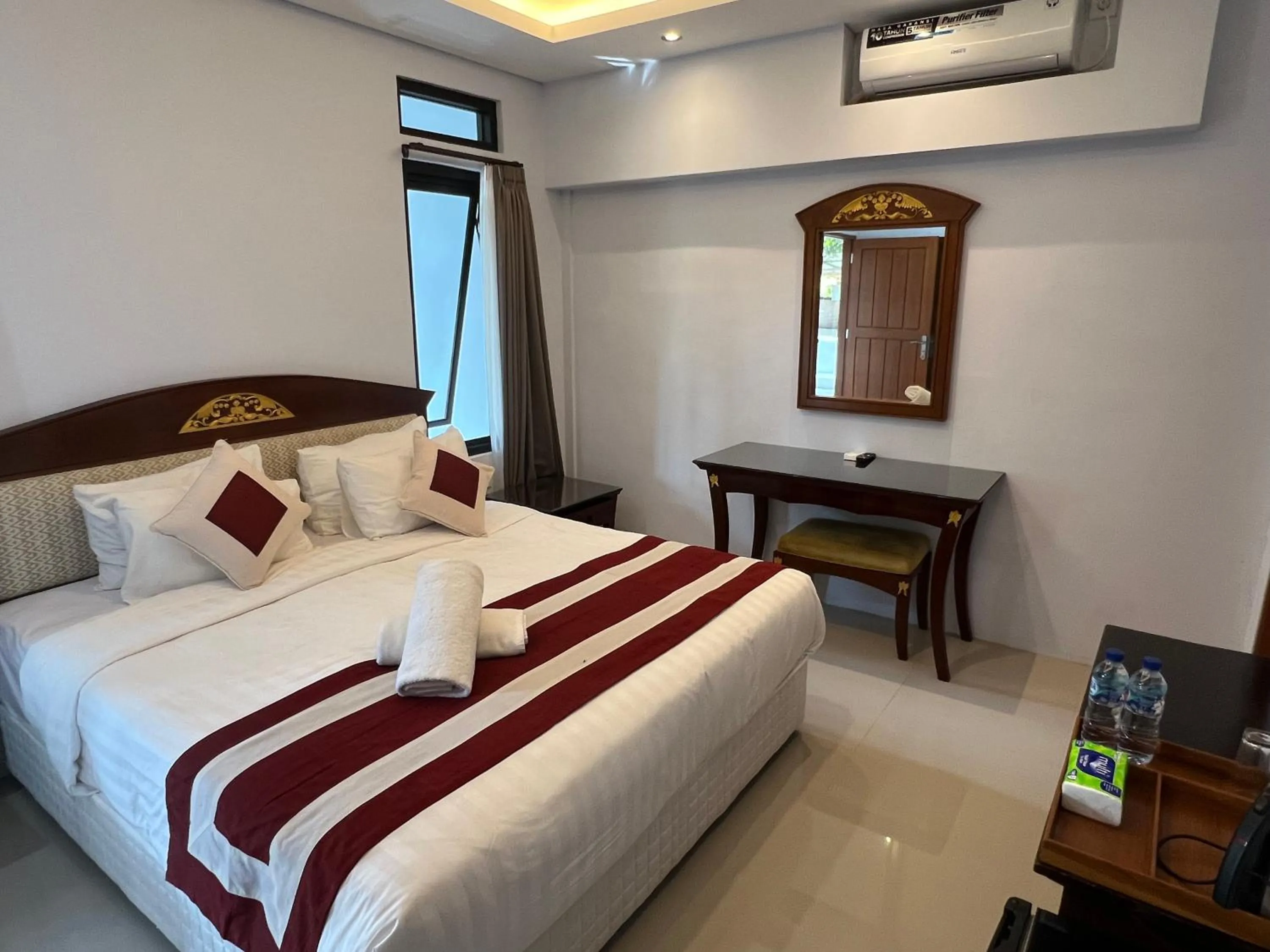 Bed in Mandhasativa Homestay