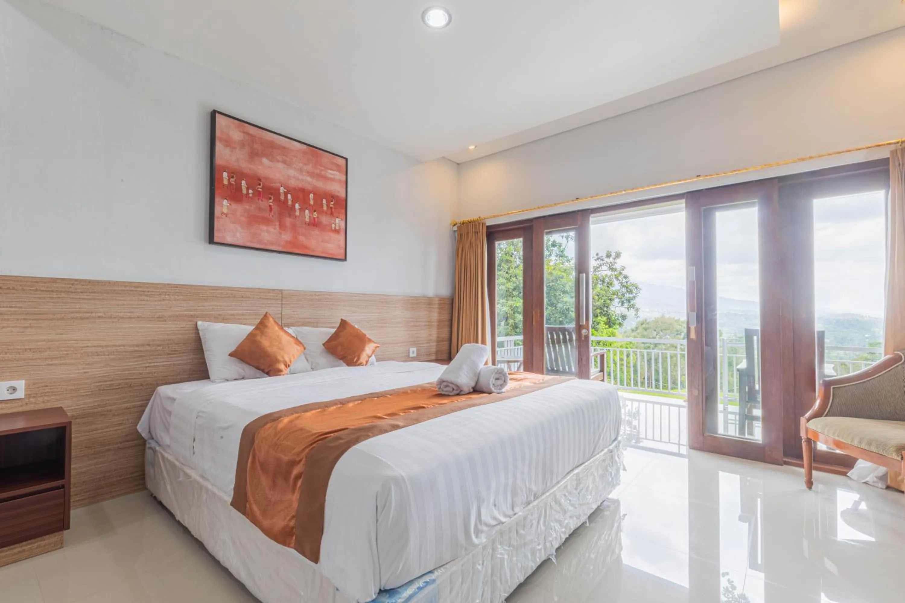 Bed in Mandhasativa Homestay