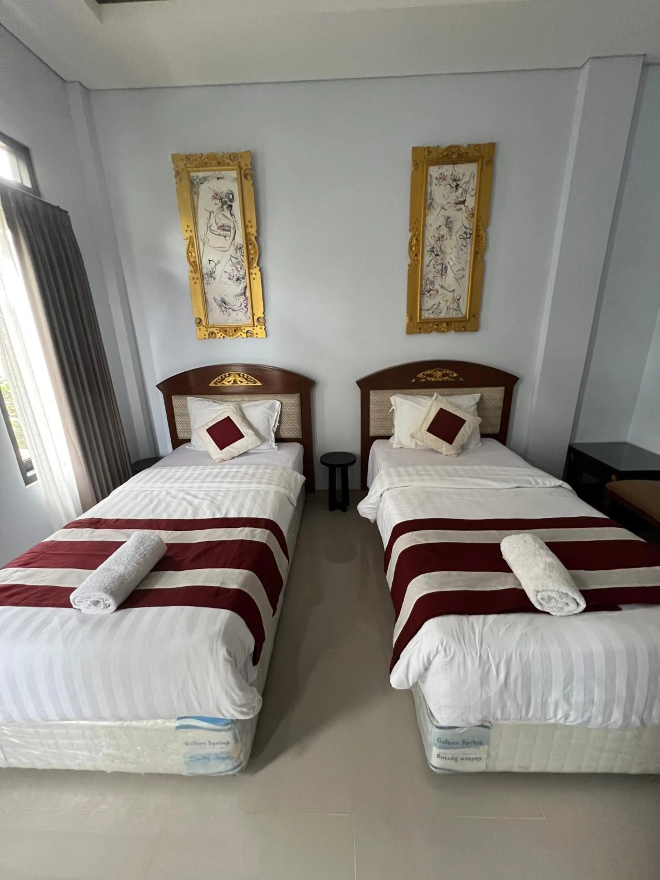 Bed in Mandhasativa Homestay