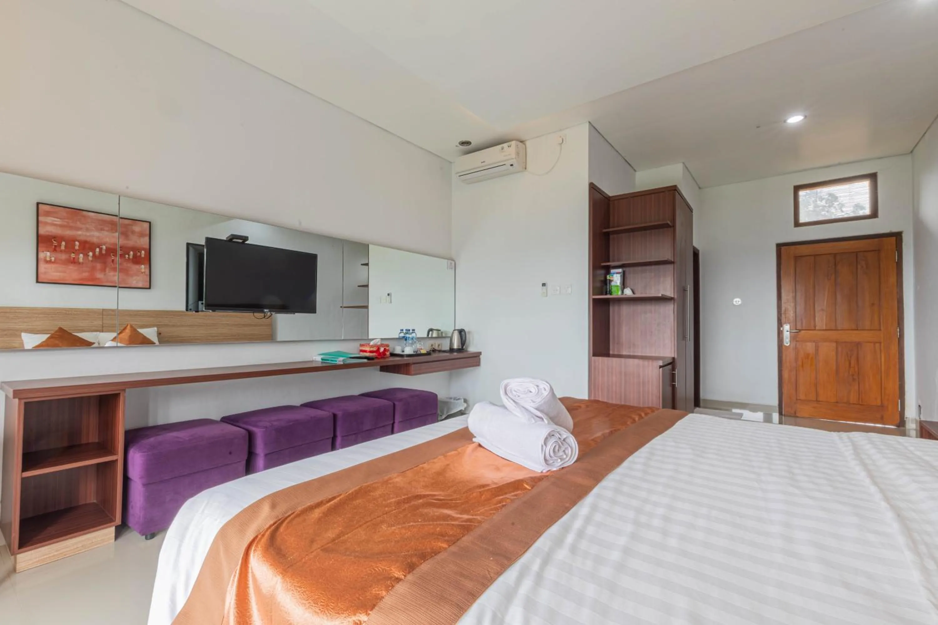 Bed in Mandhasativa Homestay