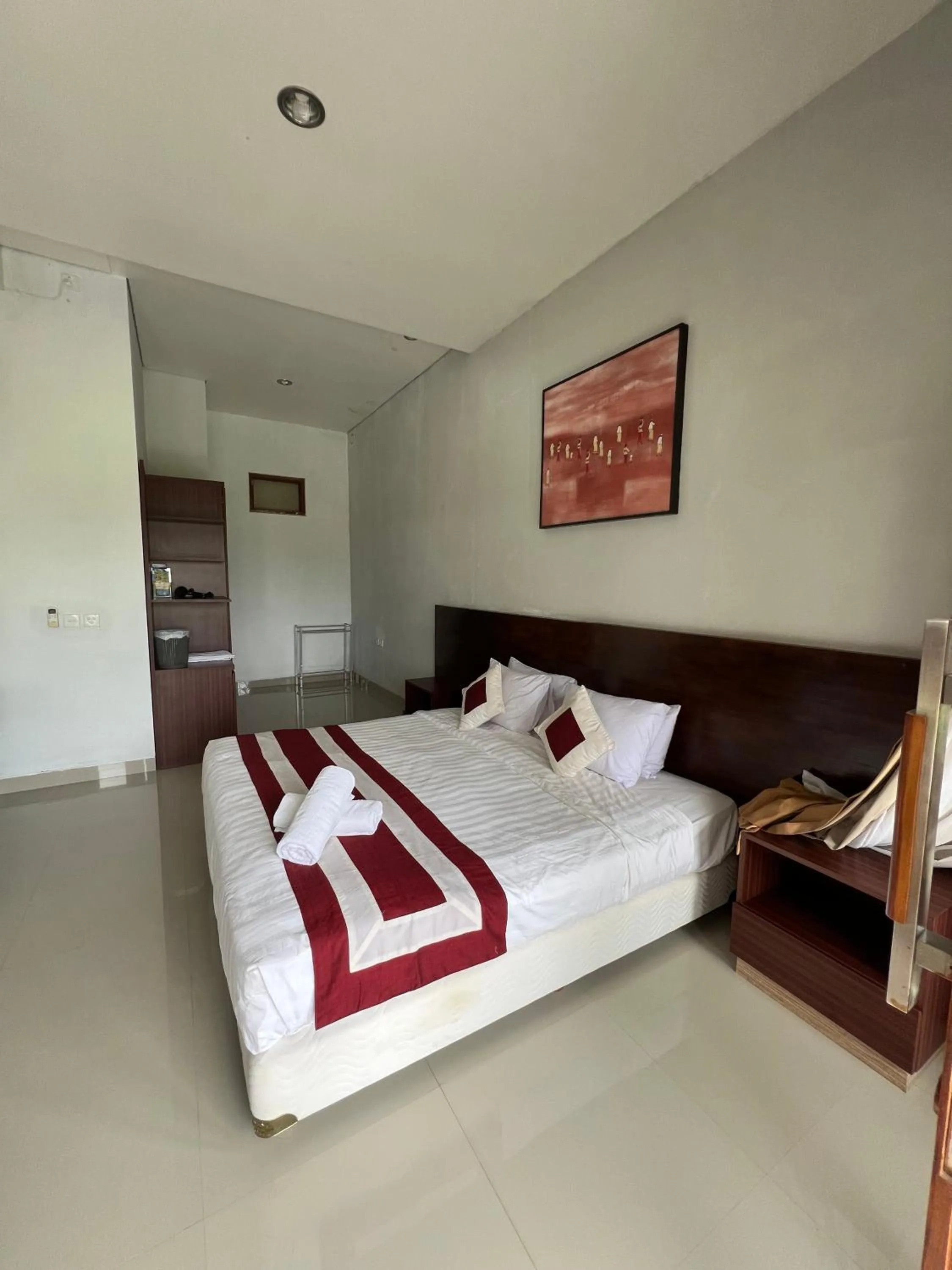 Bed in Mandhasativa Homestay