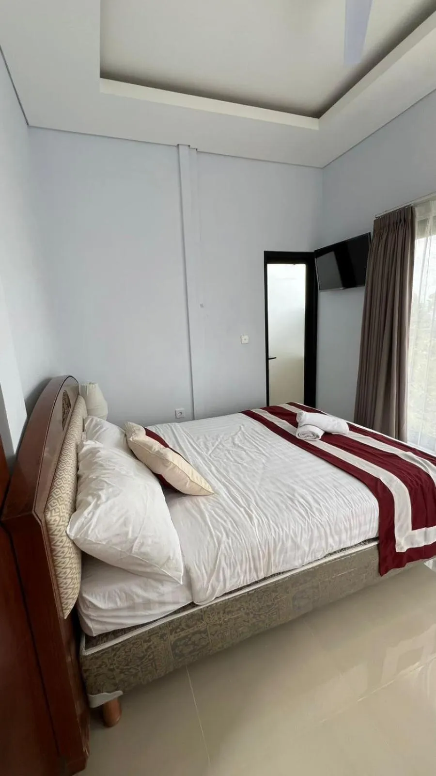 Bed in Mandhasativa Homestay