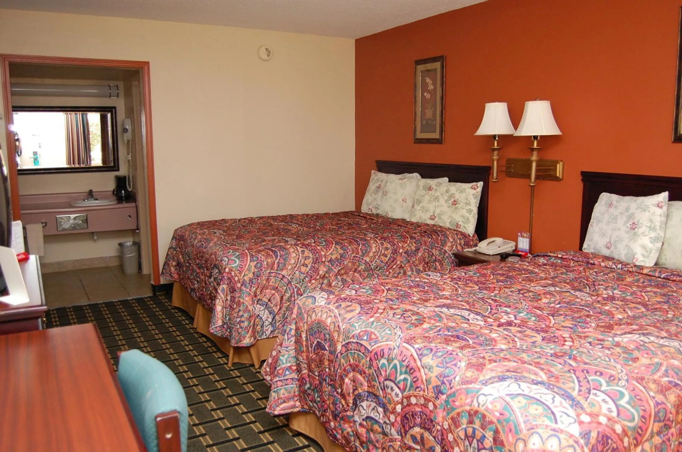 Bed in Executive Inn and Suites Springdale