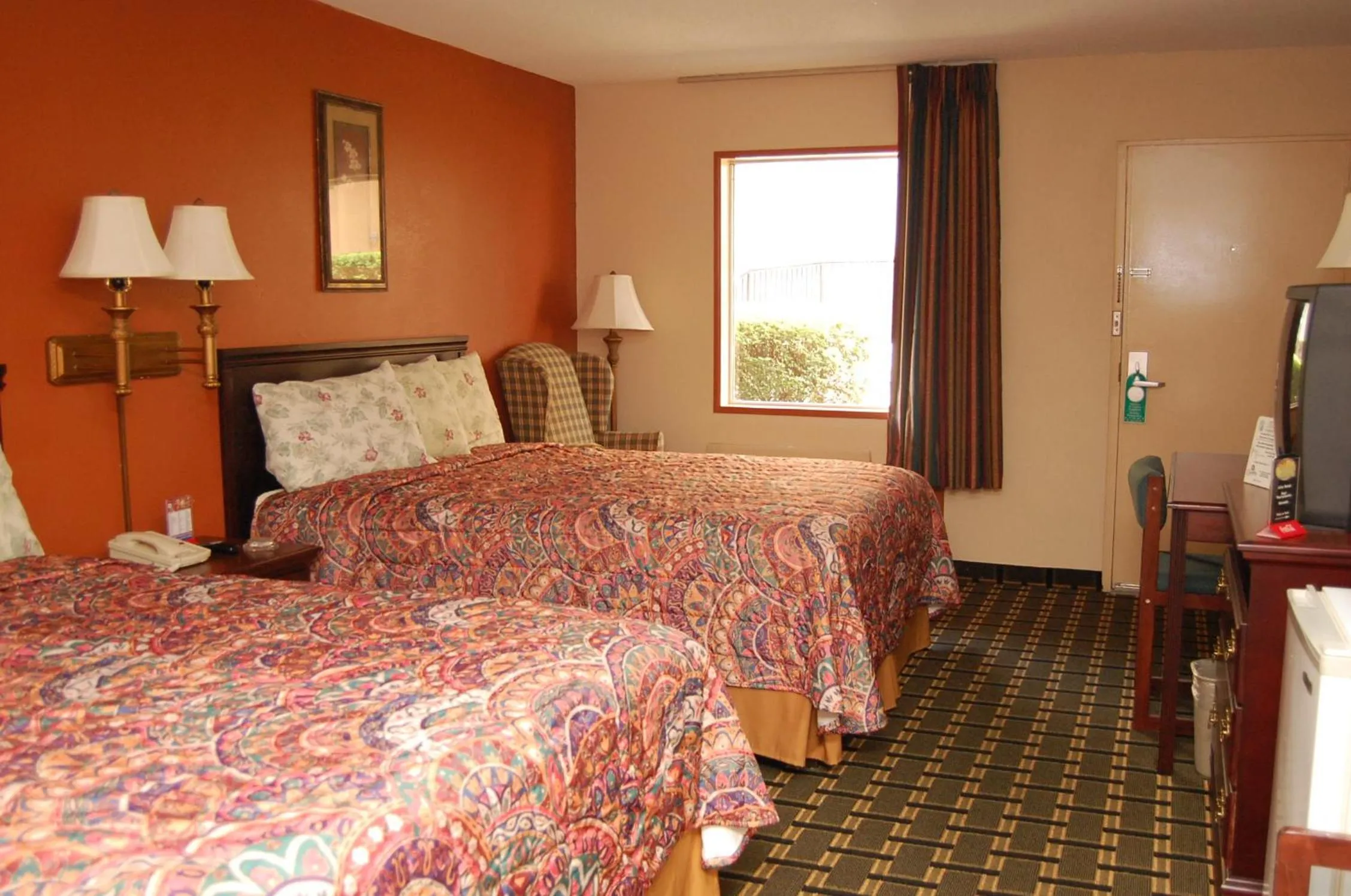 Bed in Executive Inn and Suites Springdale
