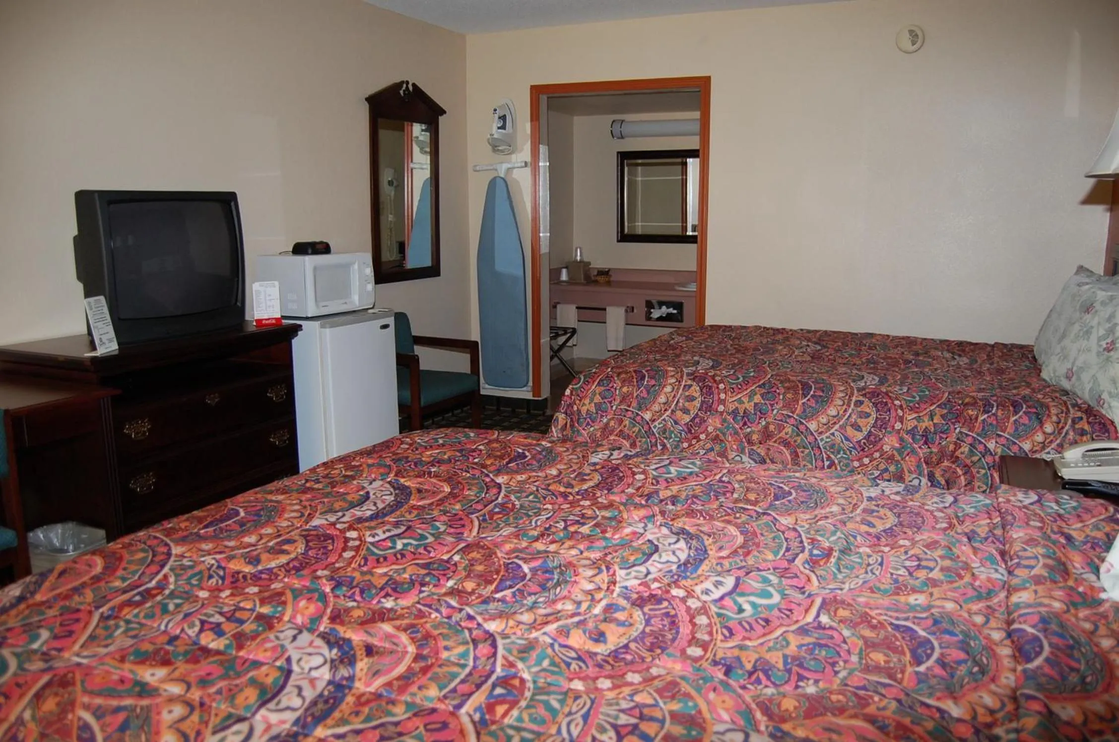 Bed in Executive Inn and Suites Springdale