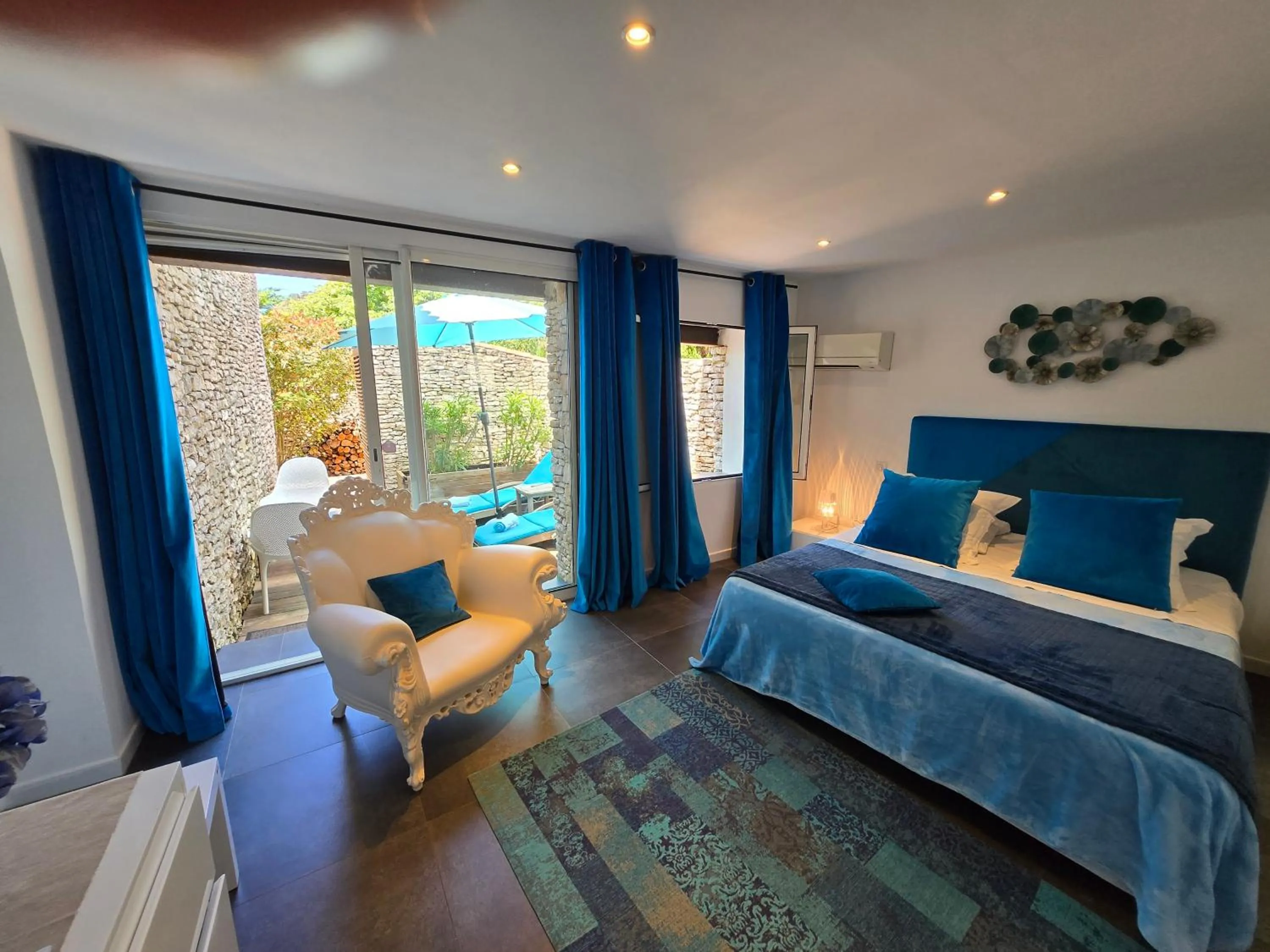 Bed in Villa Petra Bianca Suites & Chambres