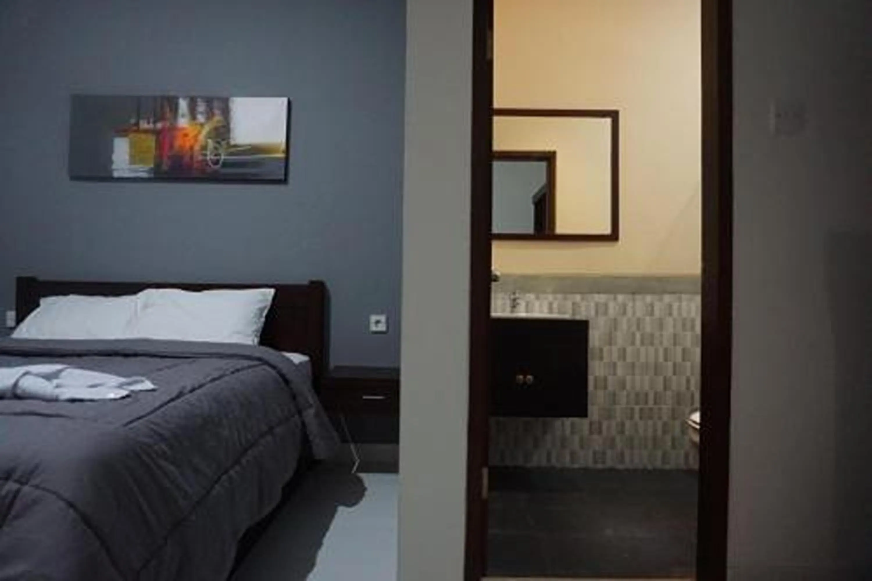 Bed in Mai Guest House Sanur