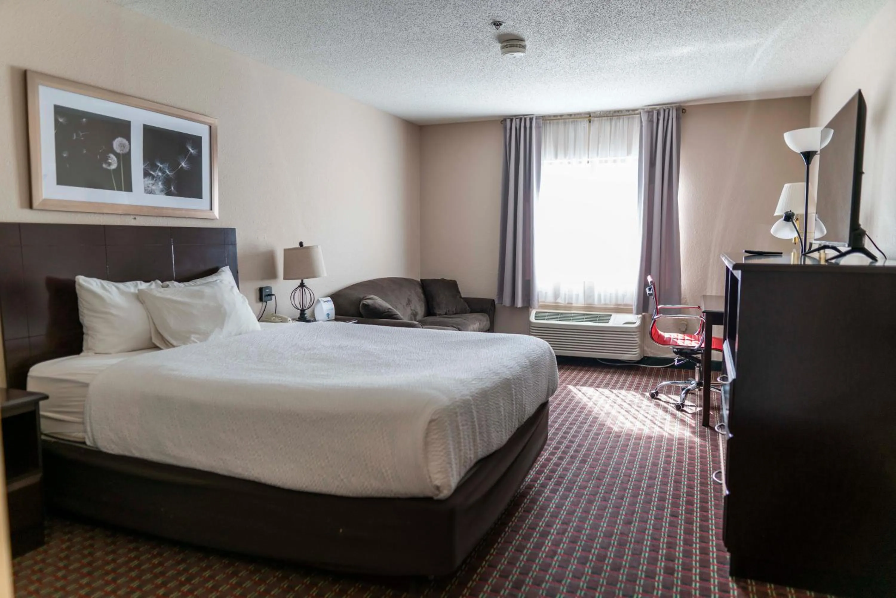 Bed in Ramada by Wyndham Tell City