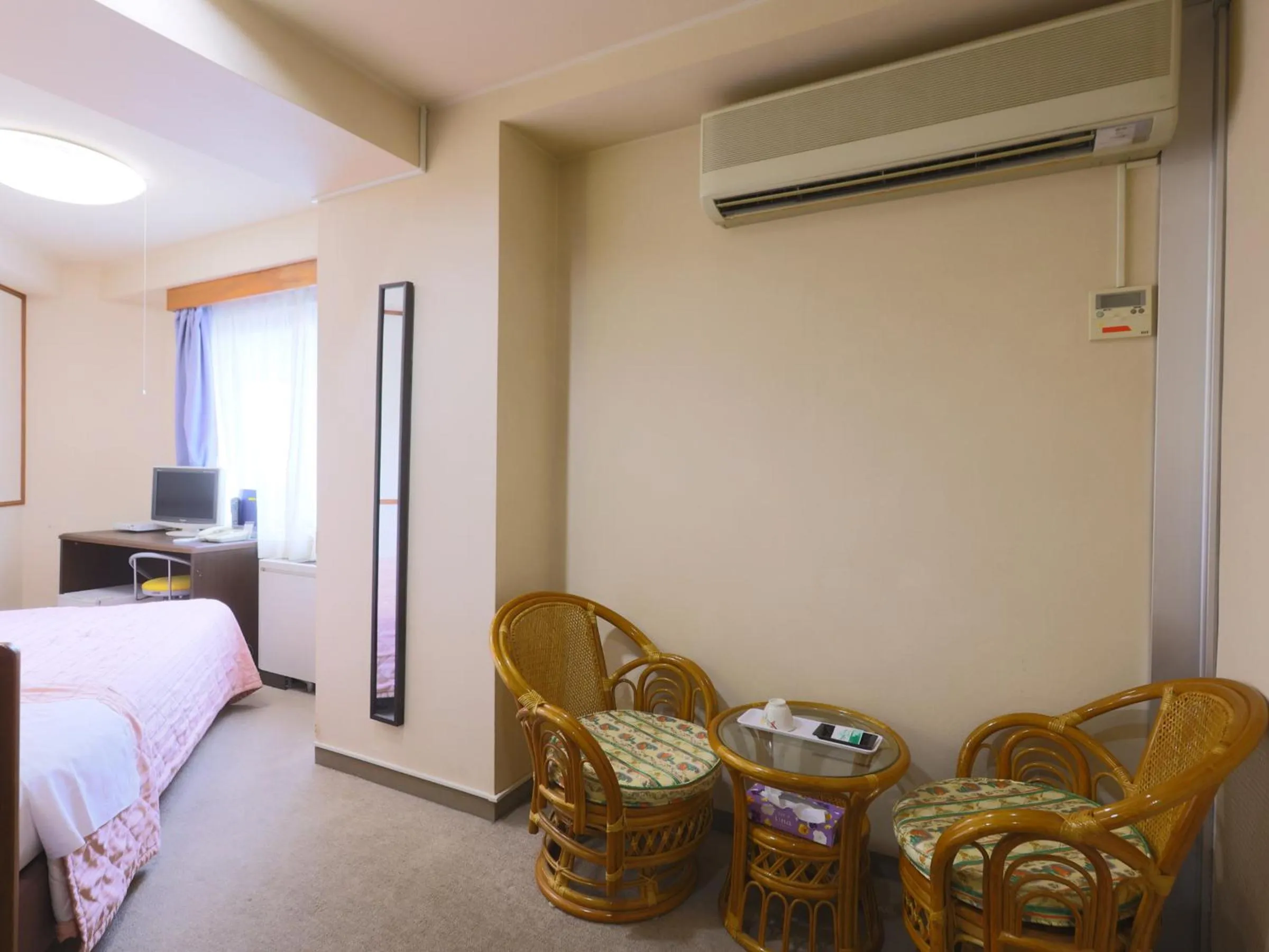 Bed in Hotel Sunplaza Tsugaike