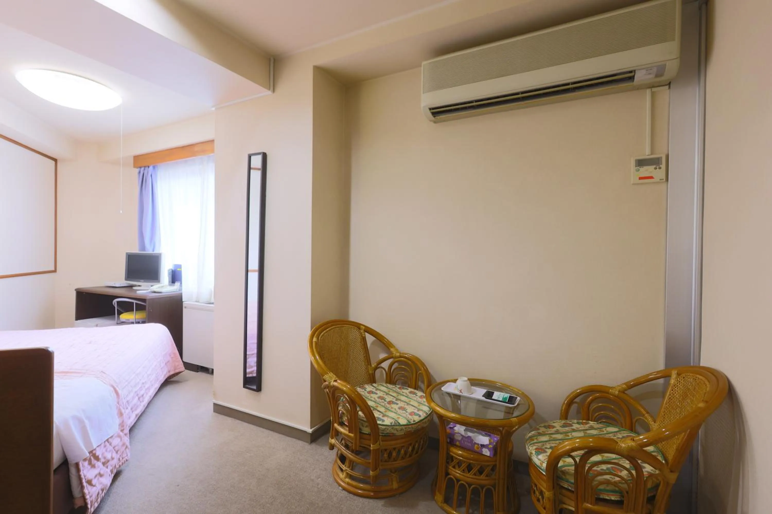 Bed in Hotel Sunplaza Tsugaike