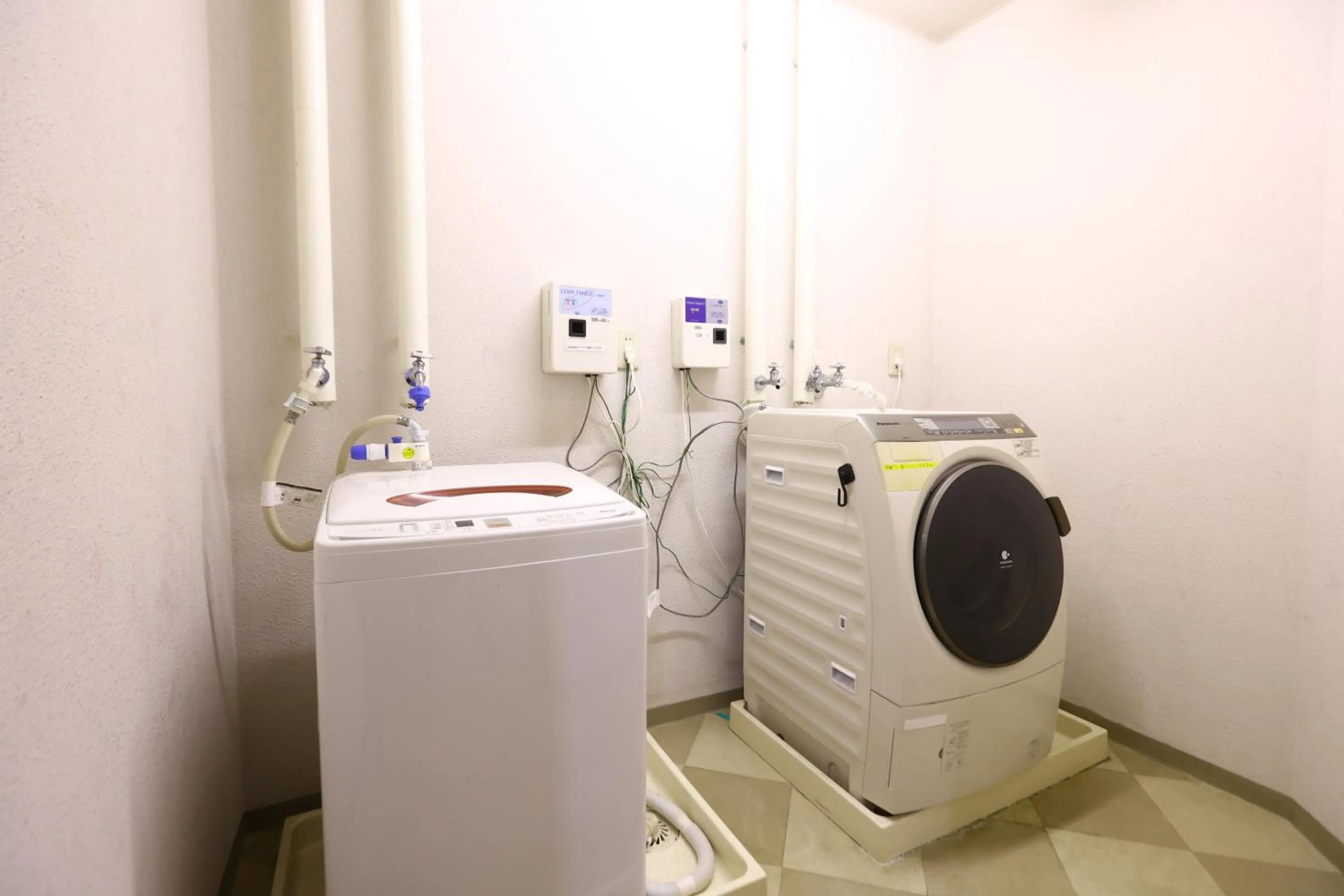 washing machine in Hotel Sunplaza Tsugaike