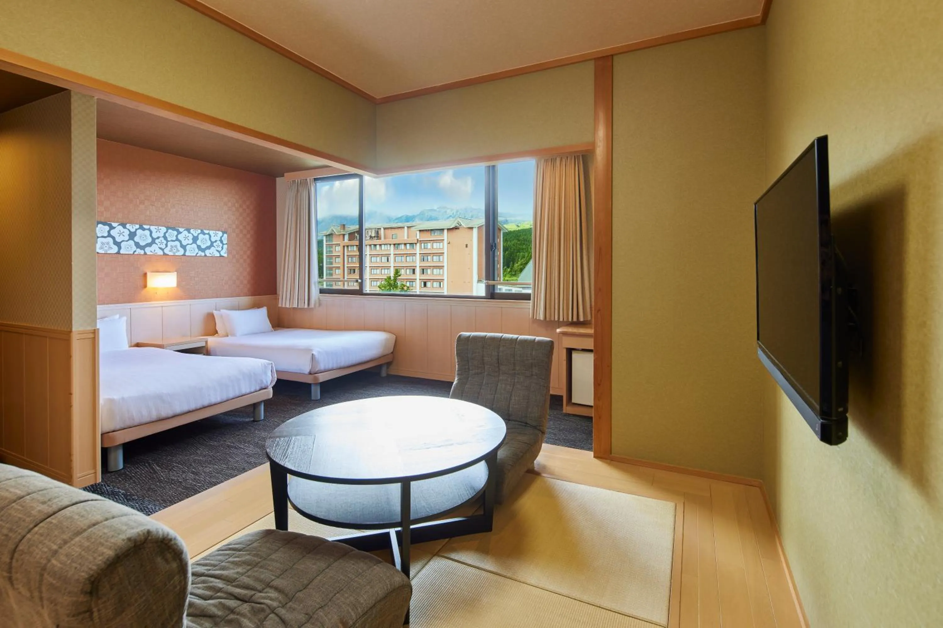 Living room, Bed in Hotel Aso No Tsukasa