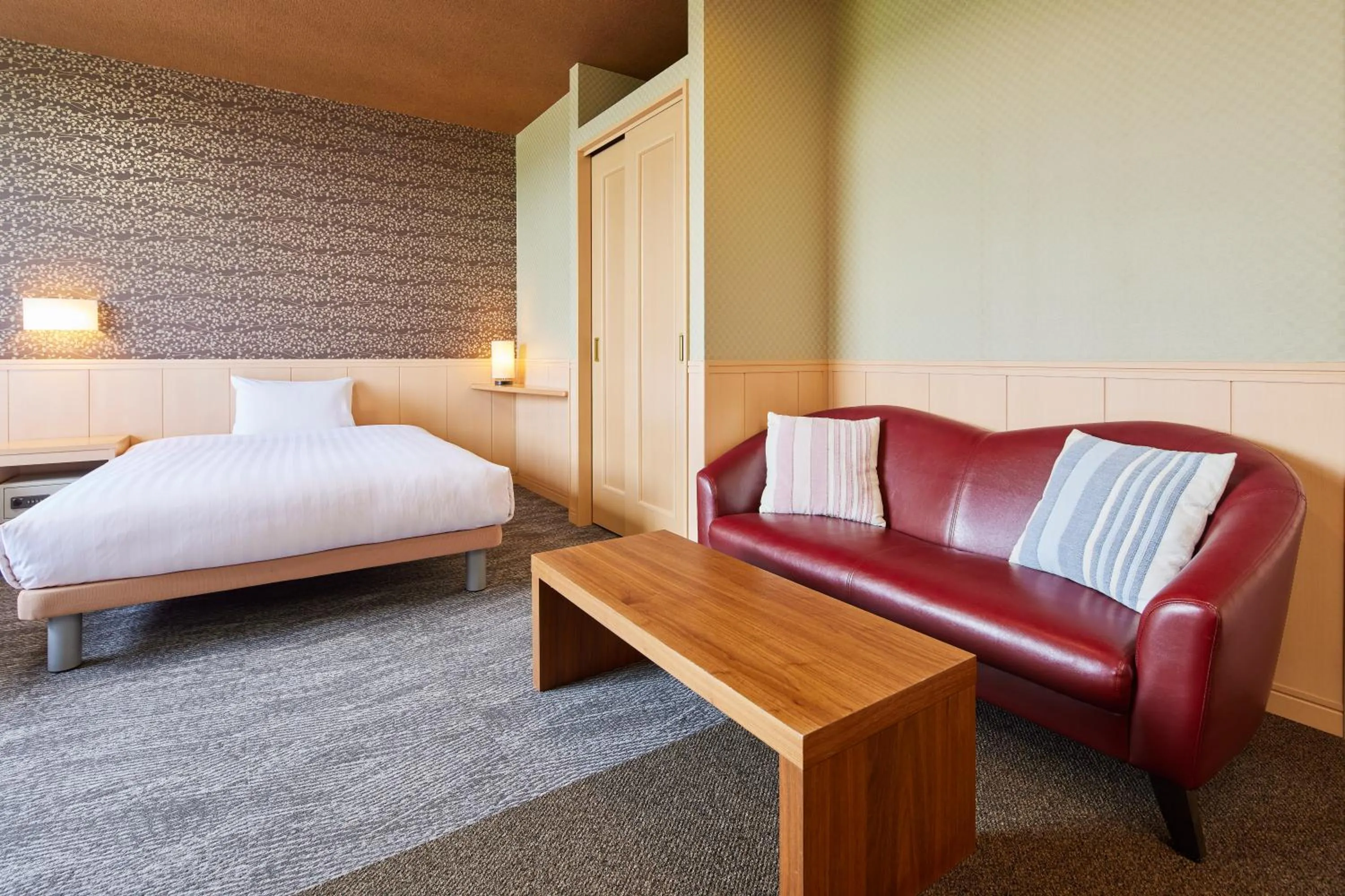 Living room, Bed in Hotel Aso No Tsukasa
