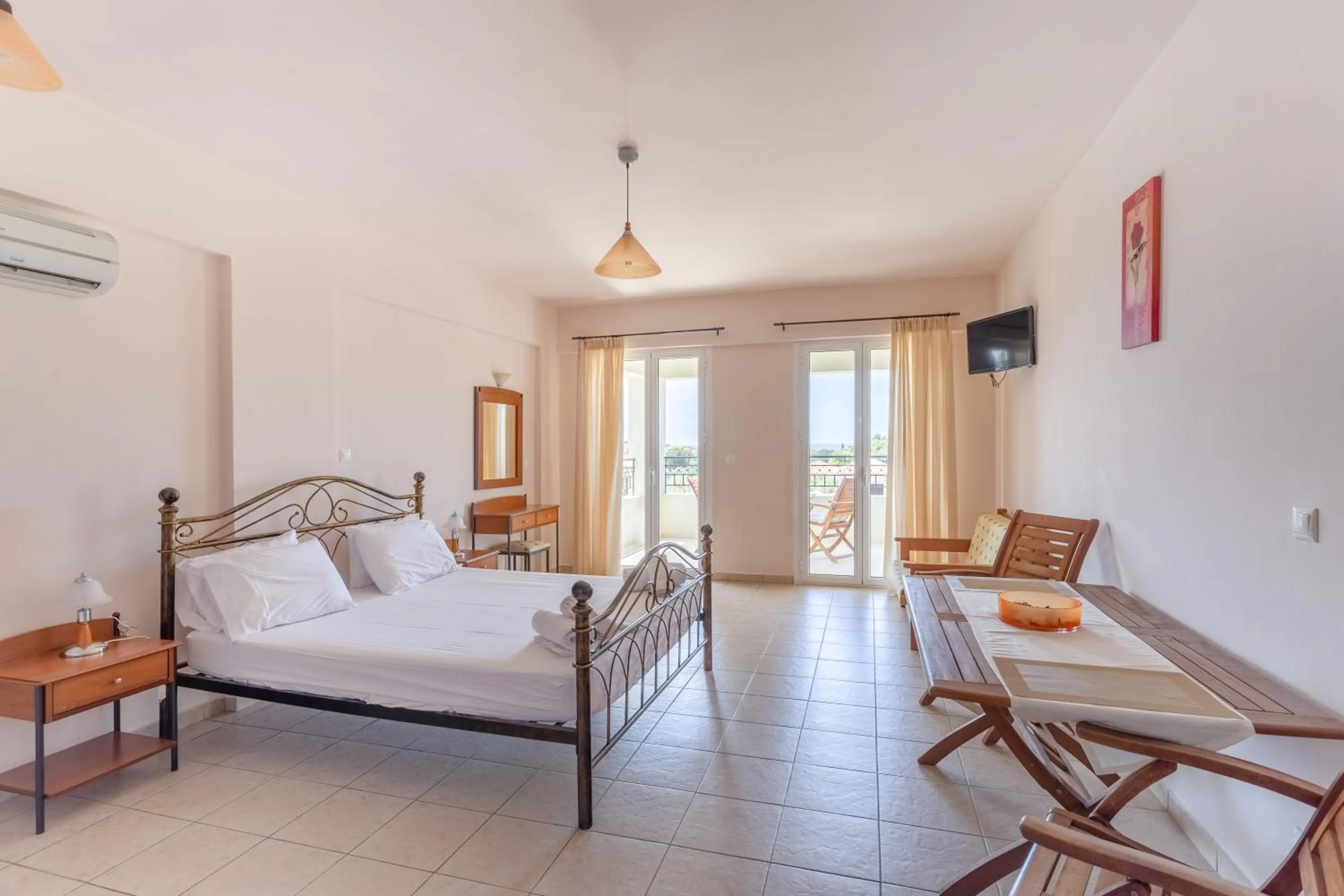 Bed in Hotel Aphrodite