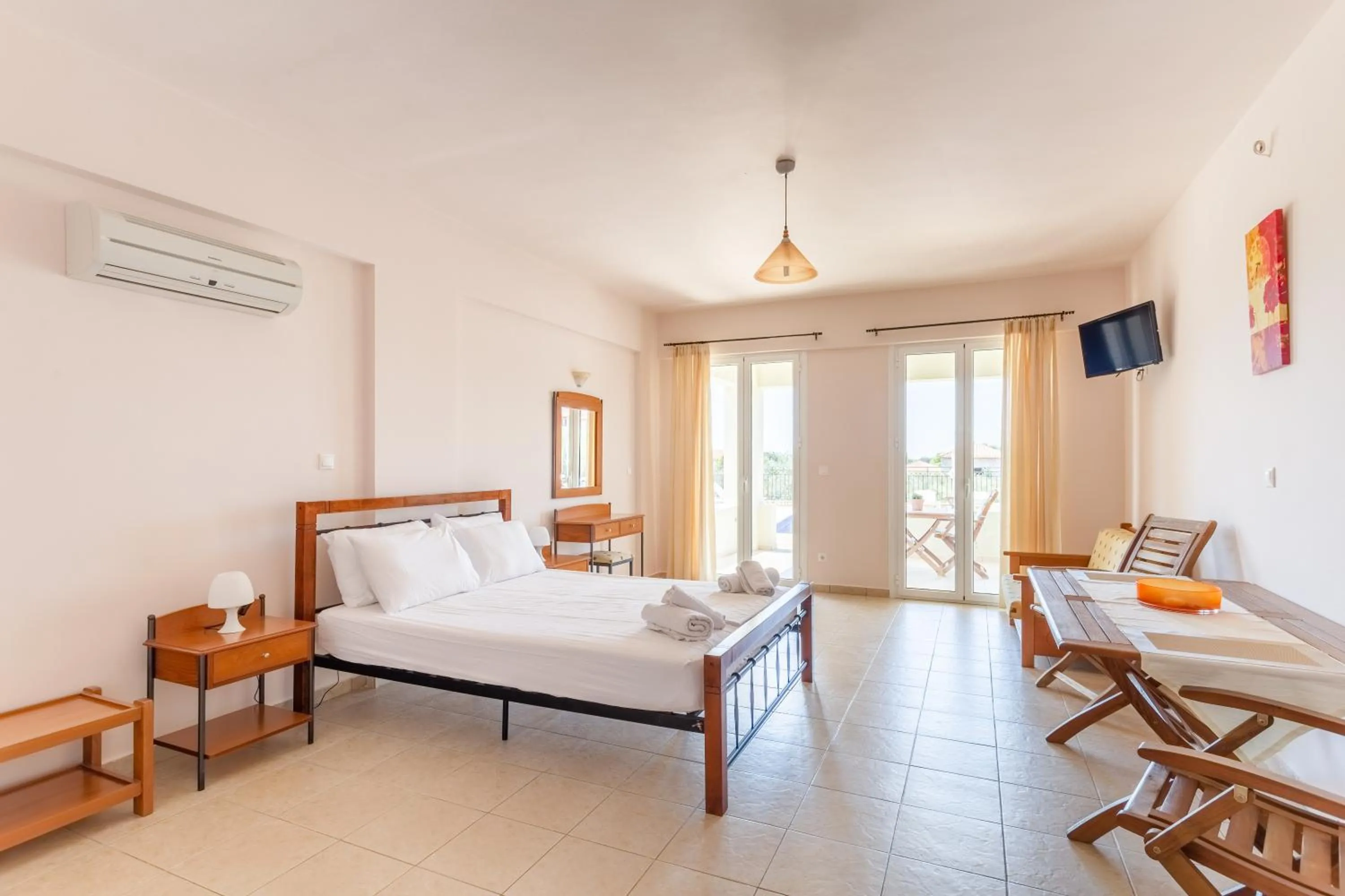 Bed in Hotel Aphrodite