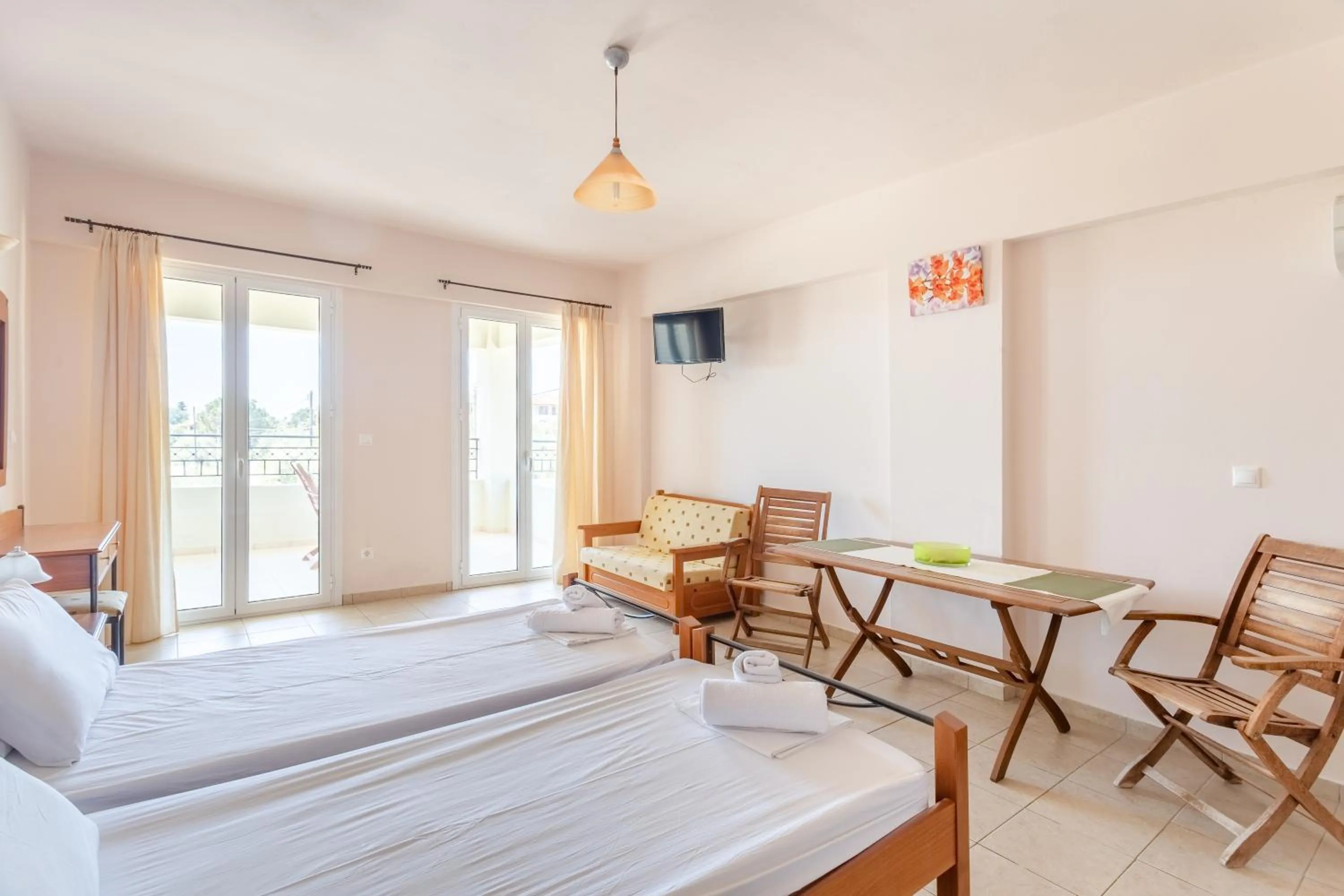 Bed in Hotel Aphrodite