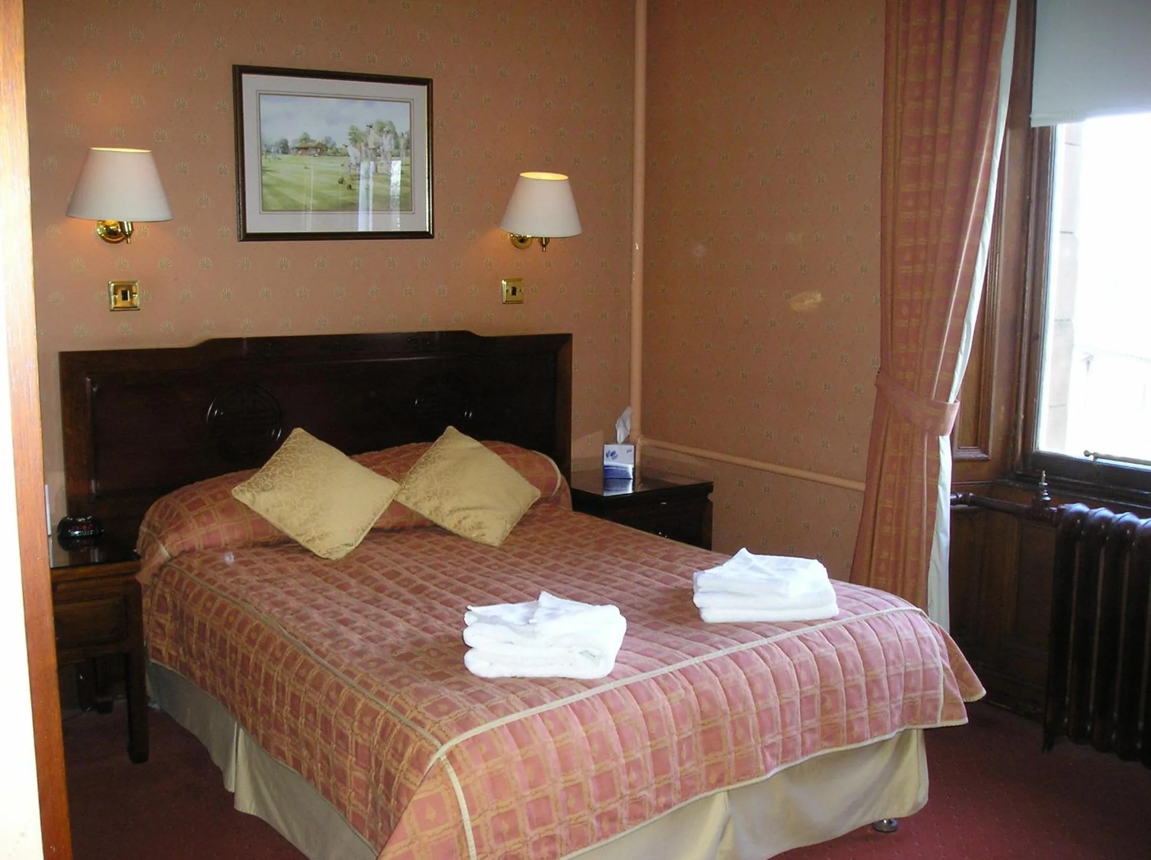 Bed in Tayside Hotel