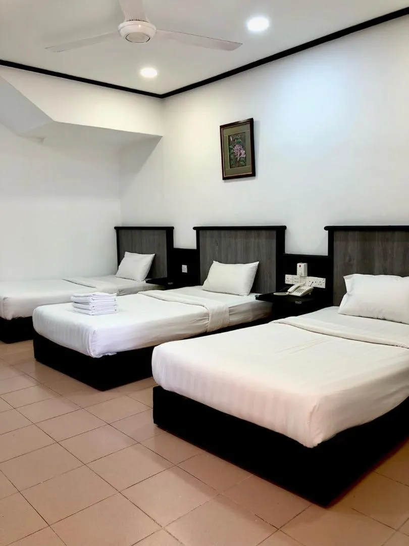 Bed in Intan Beach Resort