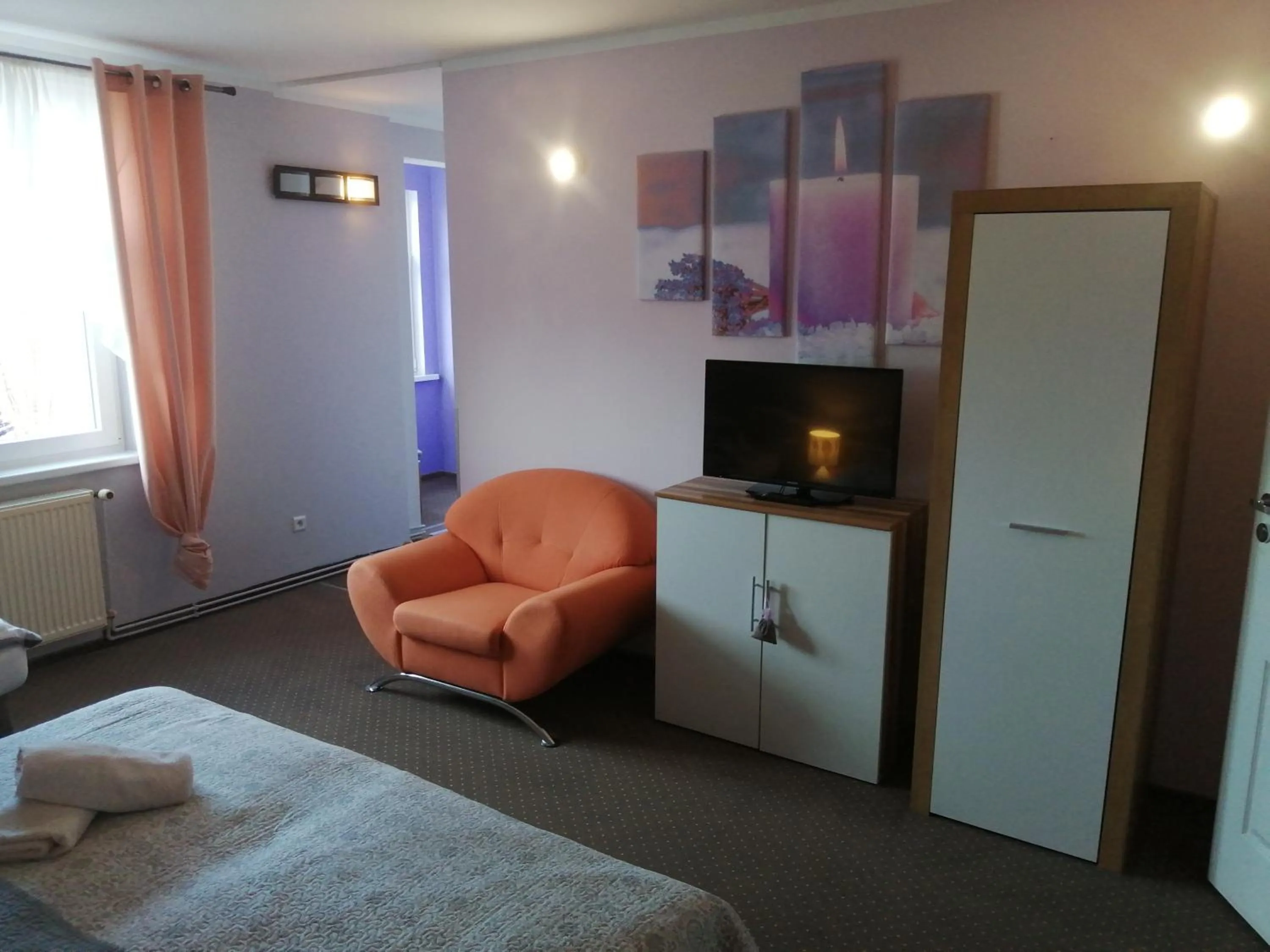 Communal lounge/ TV room, Bed in Lawendowy Dworek