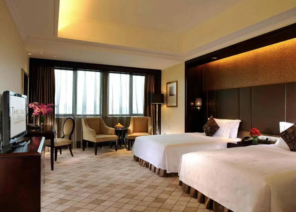 Bed in The COLI Hotel Shenzhen