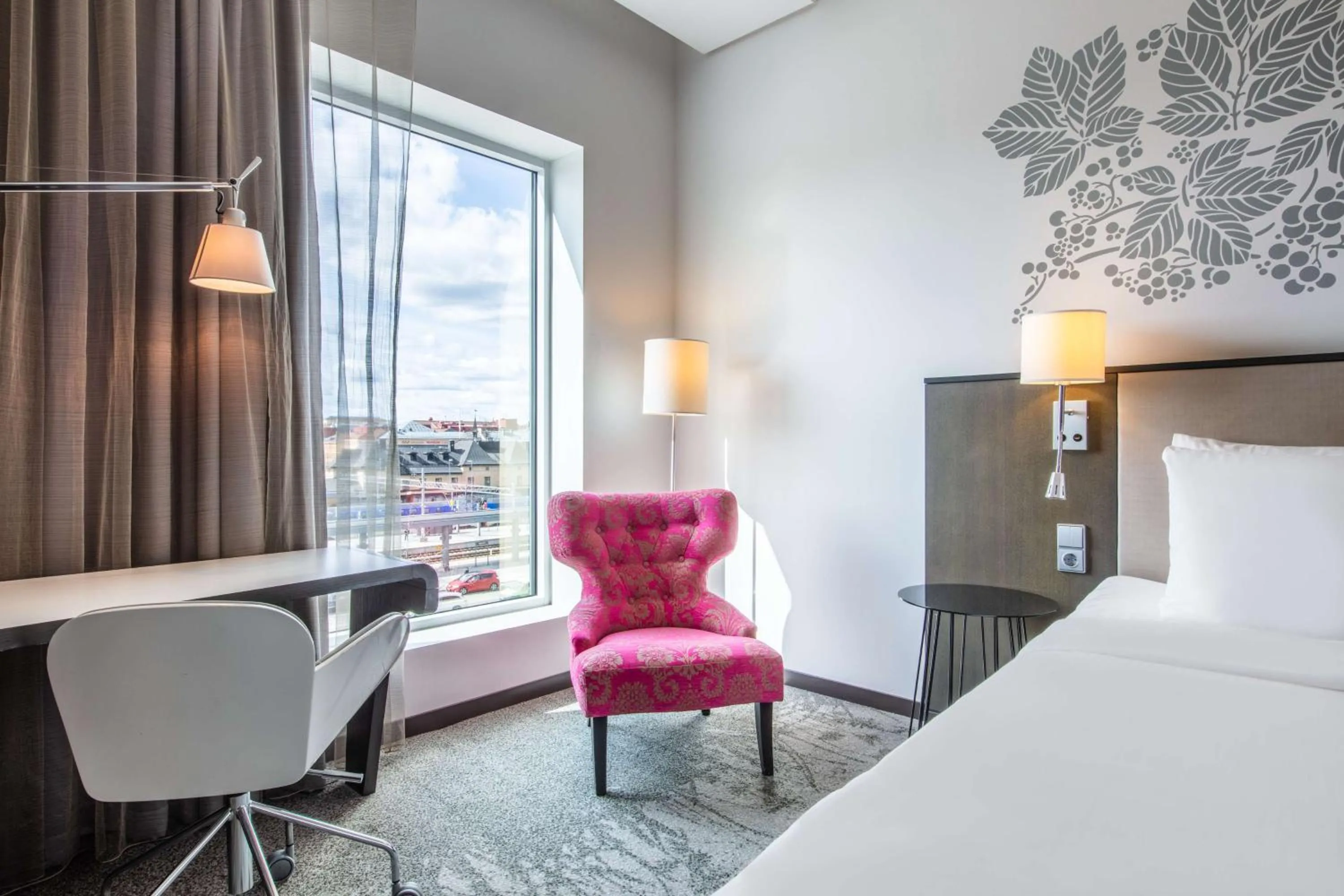 Seating area, Bed in Radisson Blu Hotel Uppsala