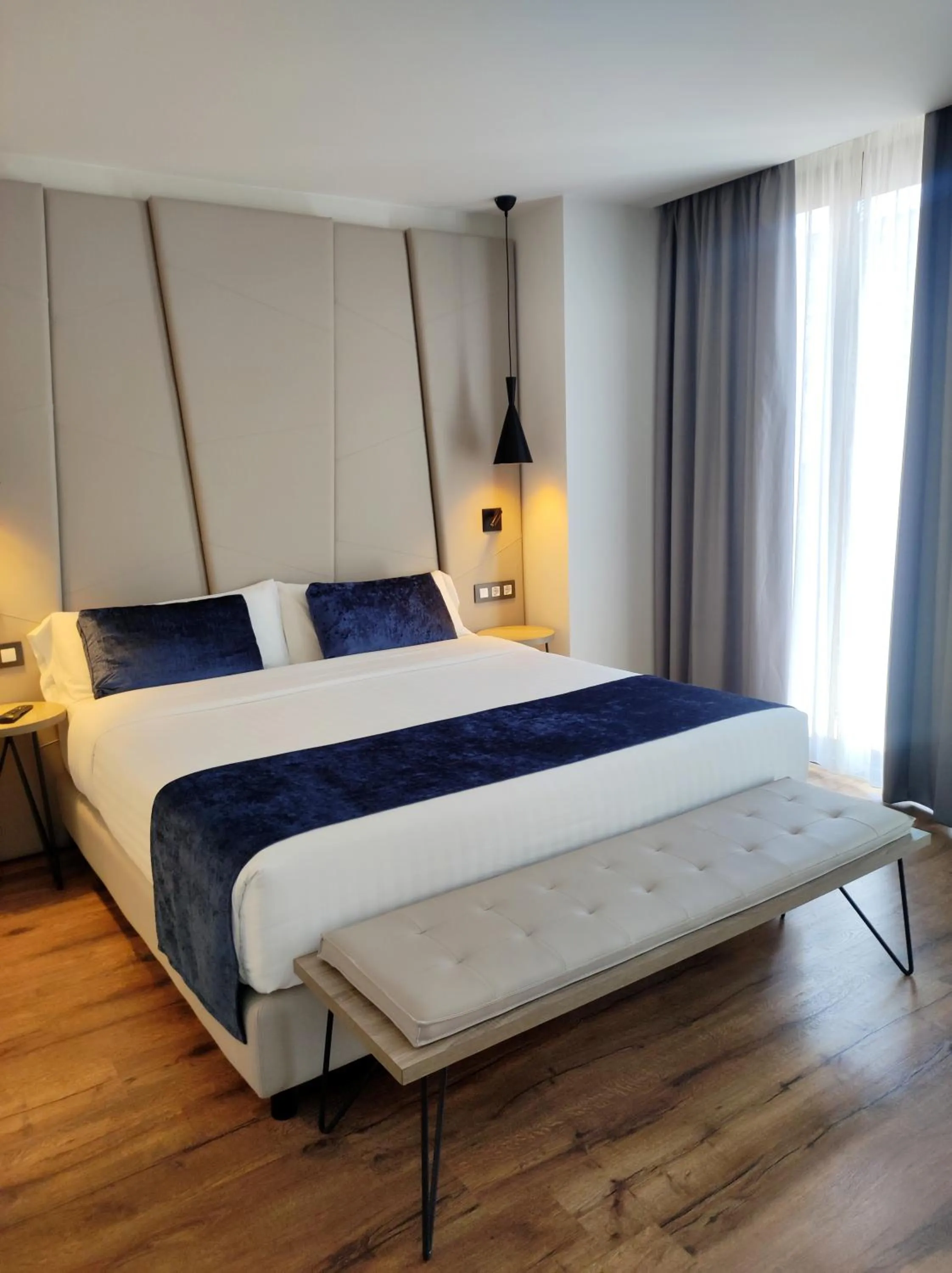 Bed in Taverna de la Sal Boutique Hotel