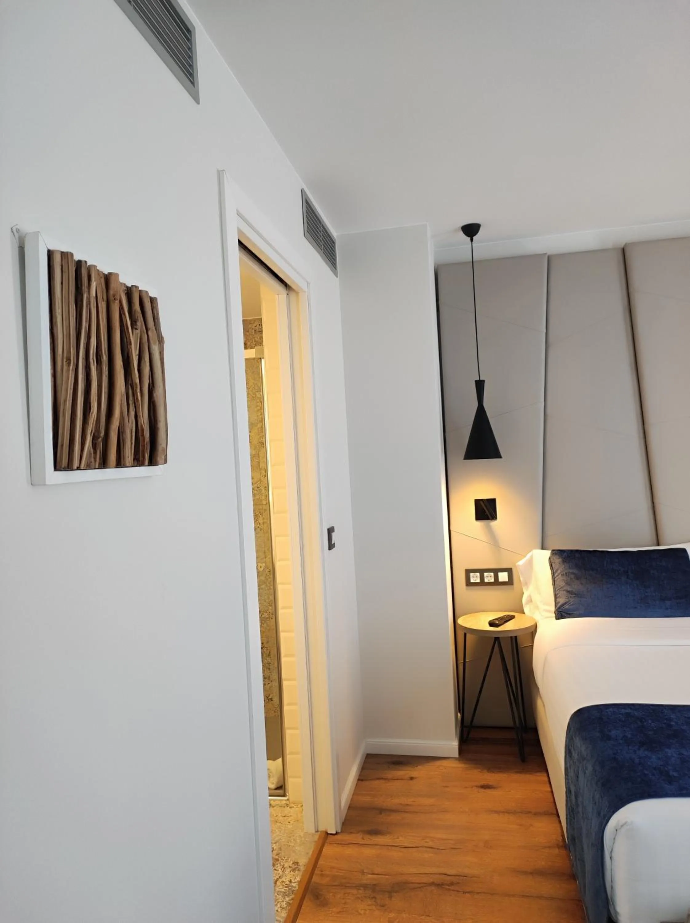 Bed in Taverna de la Sal Boutique Hotel