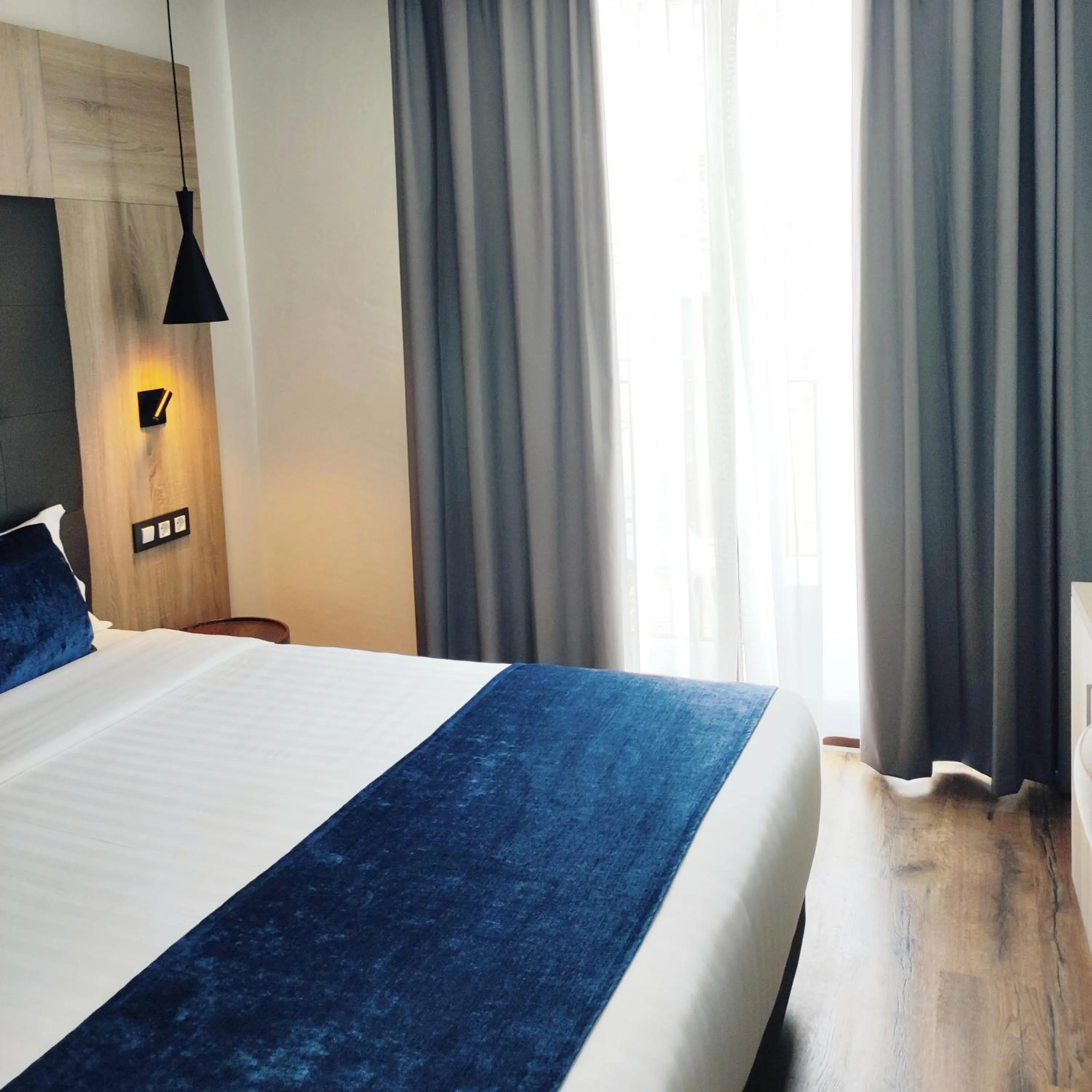 Bed in Taverna de la Sal Boutique Hotel