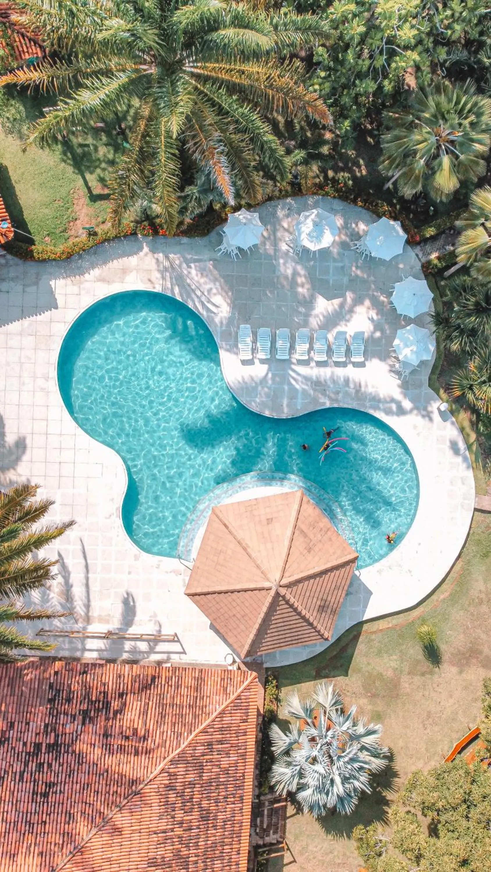 Swimming pool in Eco Pousada Paraíso dos Coqueirais