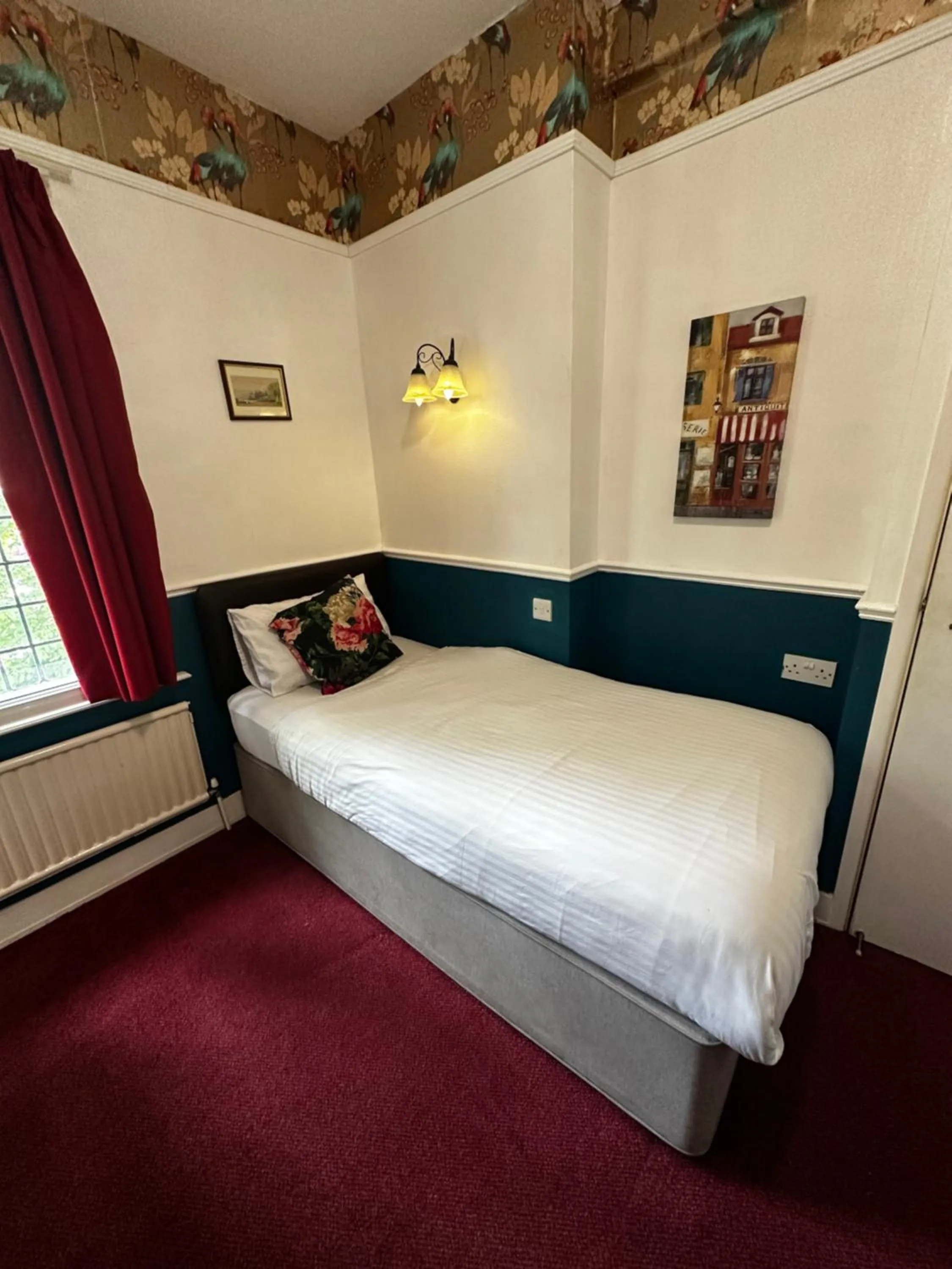Bed in Barons Court Hotel