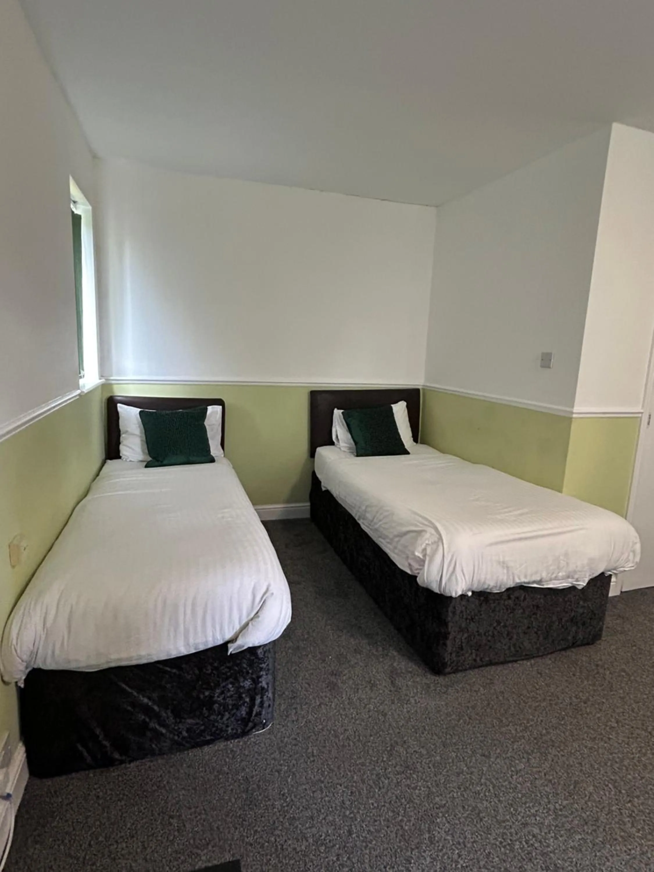 Bed in Barons Court Hotel