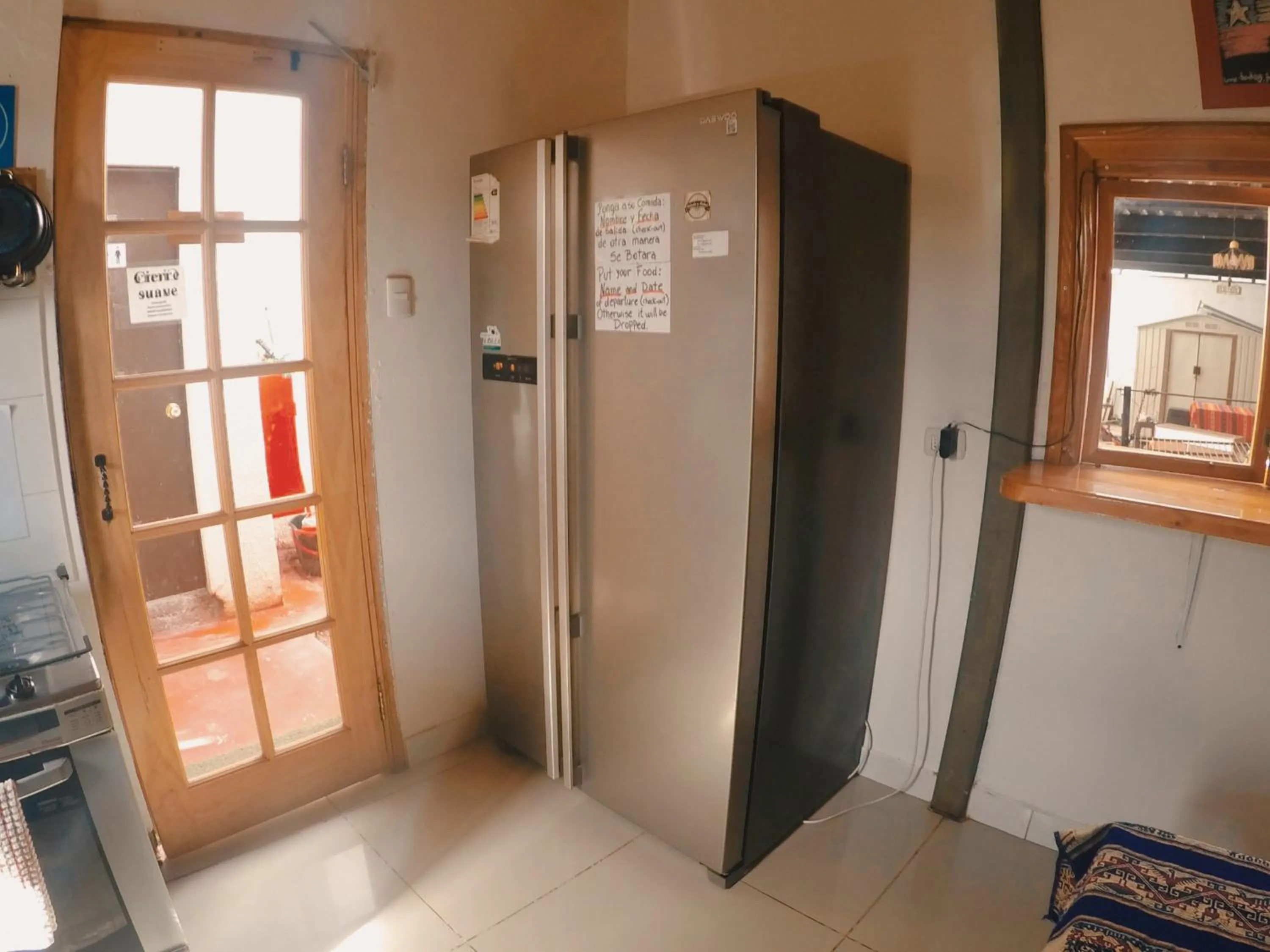 Communal kitchen in Rey Lagarto Hostel