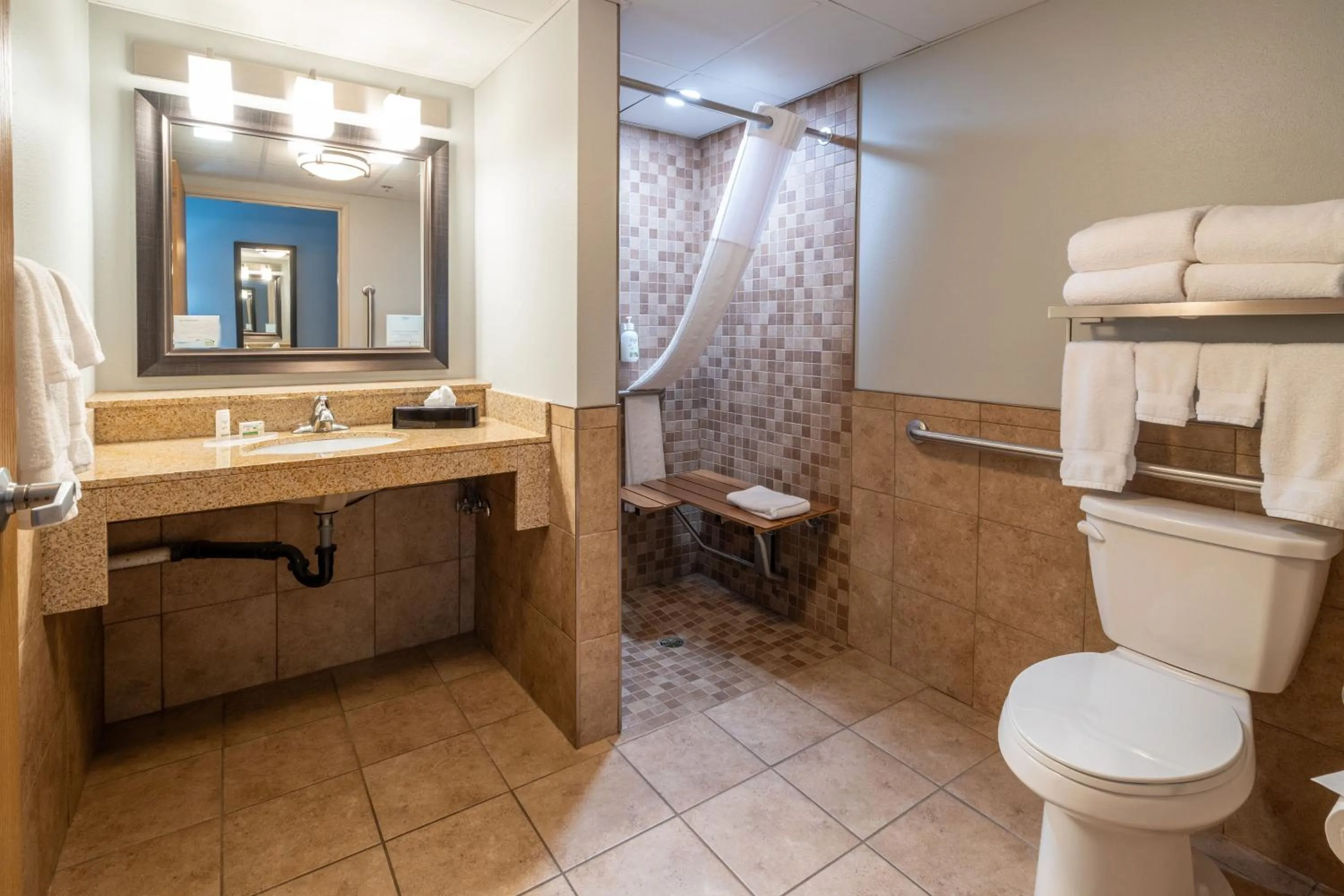 Shower in AmericInn by Wyndham Valley City Conference Center